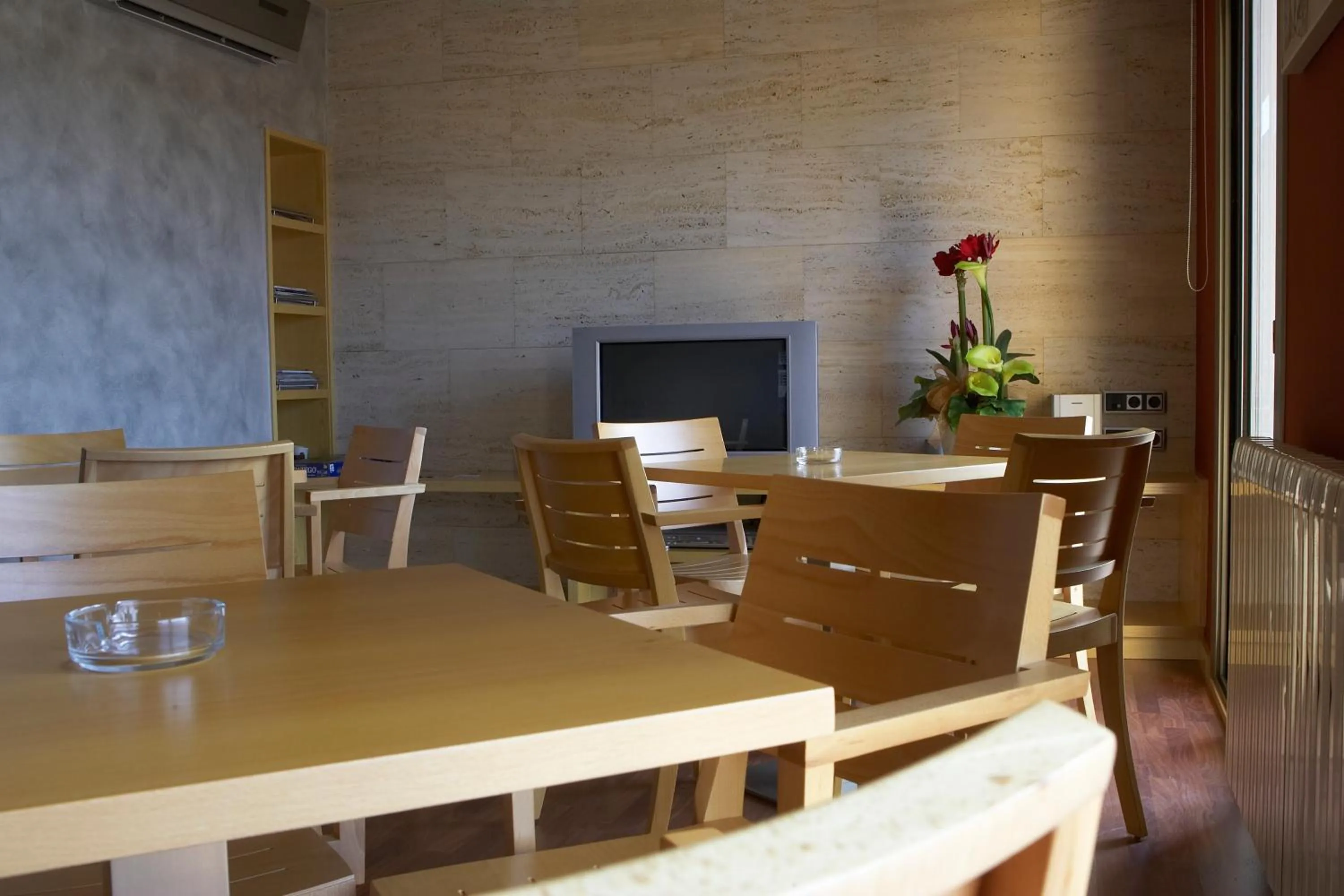 Communal lounge/ TV room in Hotel Emporium - Adults Only