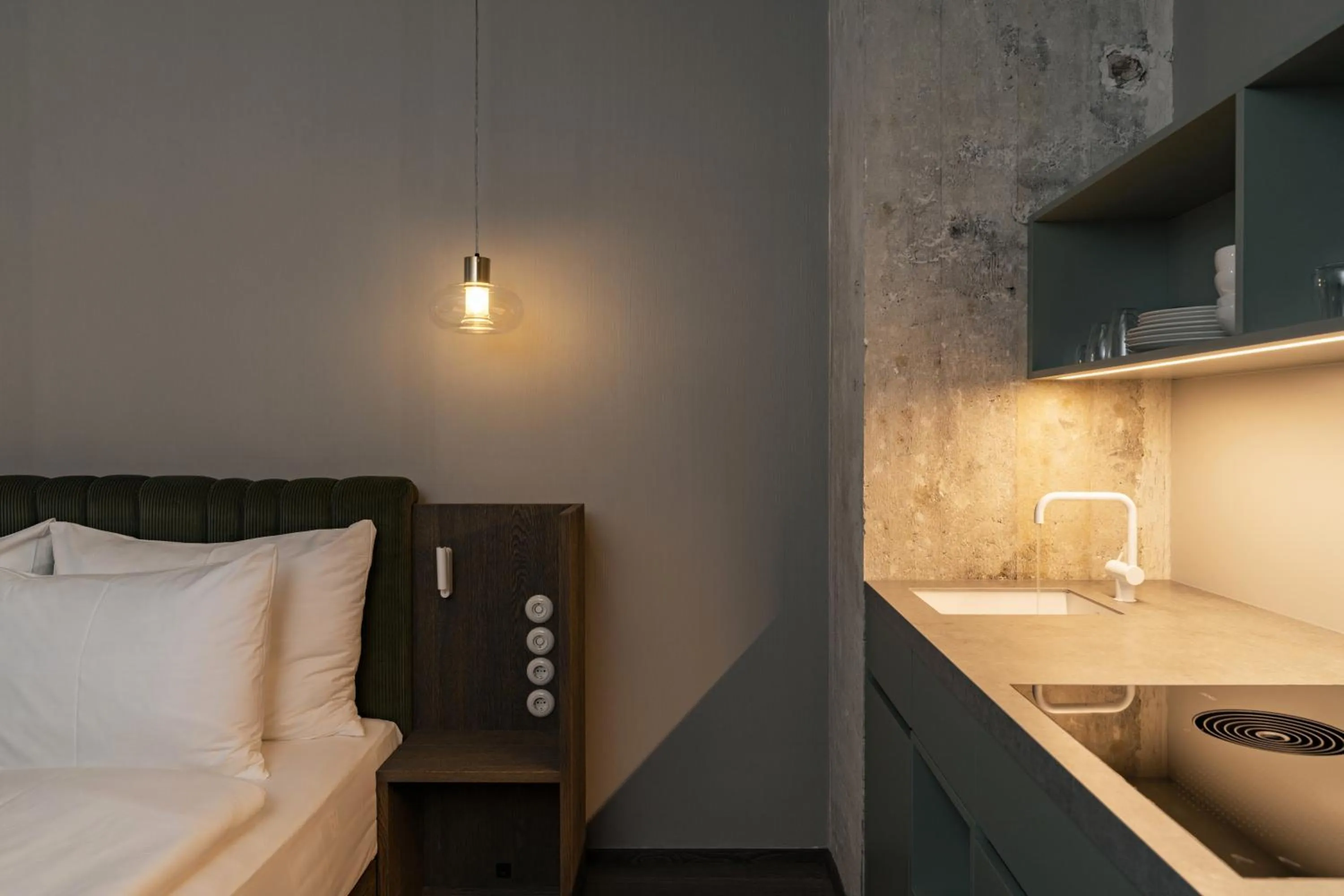 Kitchen or kitchenette, Bed in Rooms by Wolfensson - Boutique Hotel