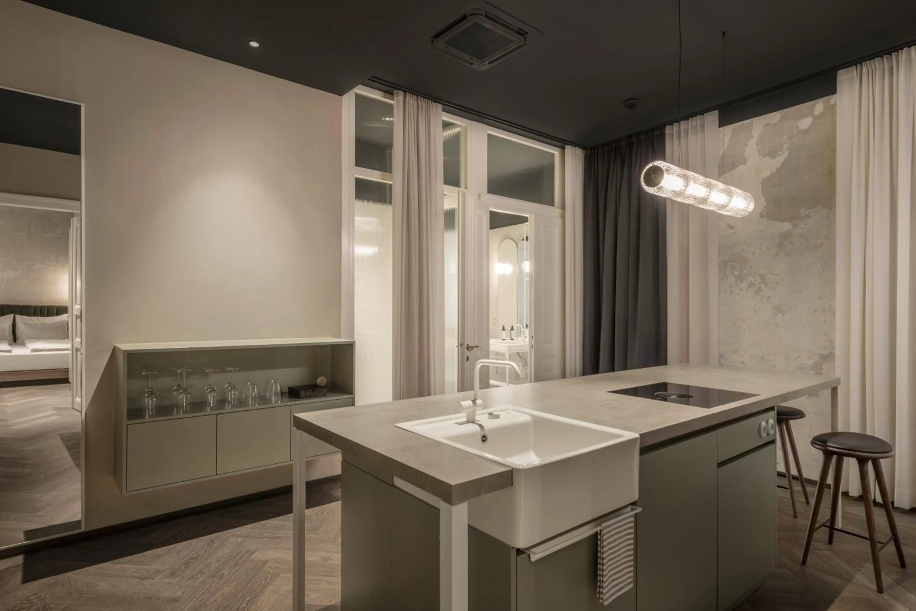 Kitchen or kitchenette, Bed in Rooms by Wolfensson - Boutique Hotel