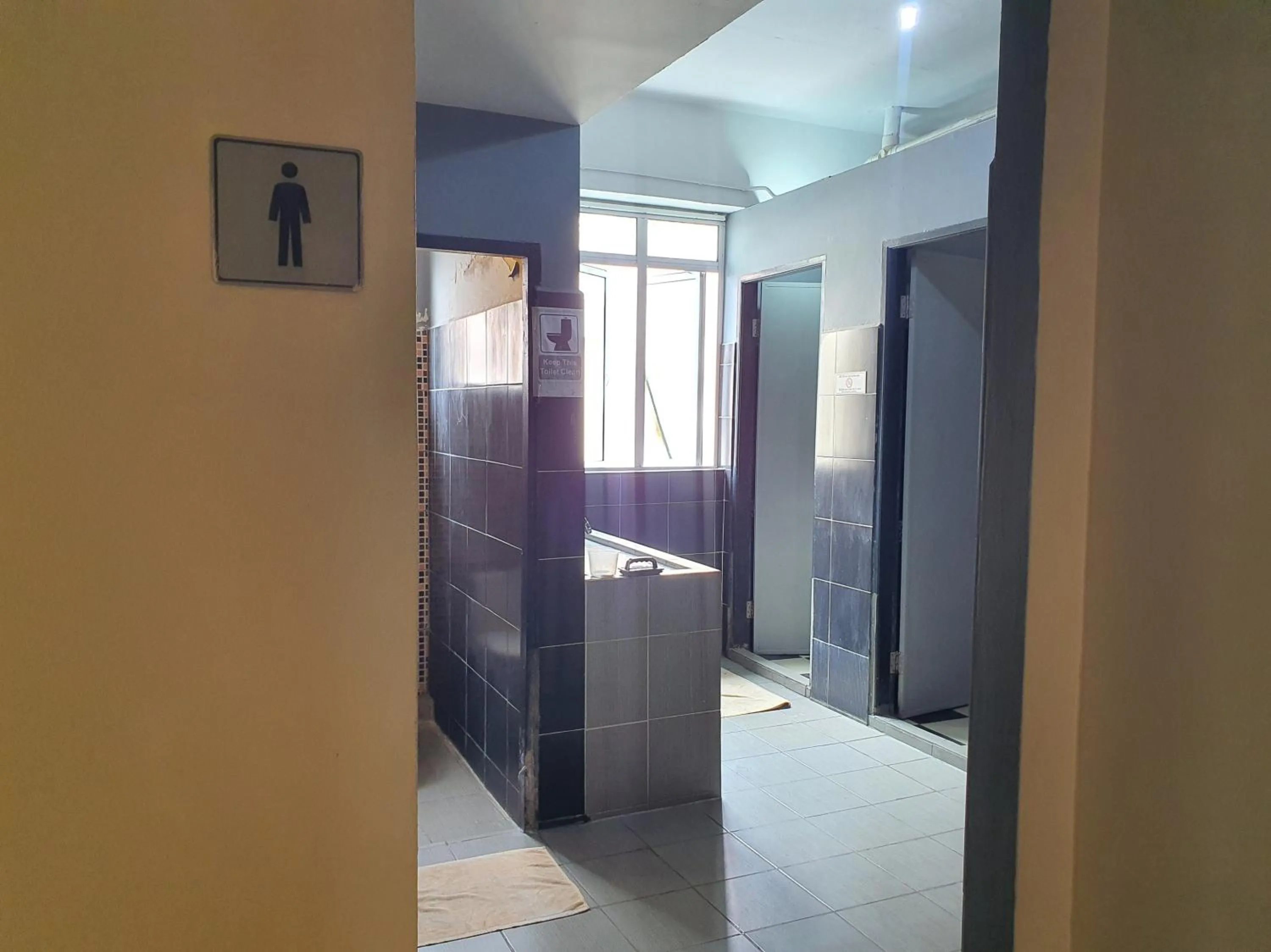 Bathroom in SPOT ON 90984 Gn Homestay