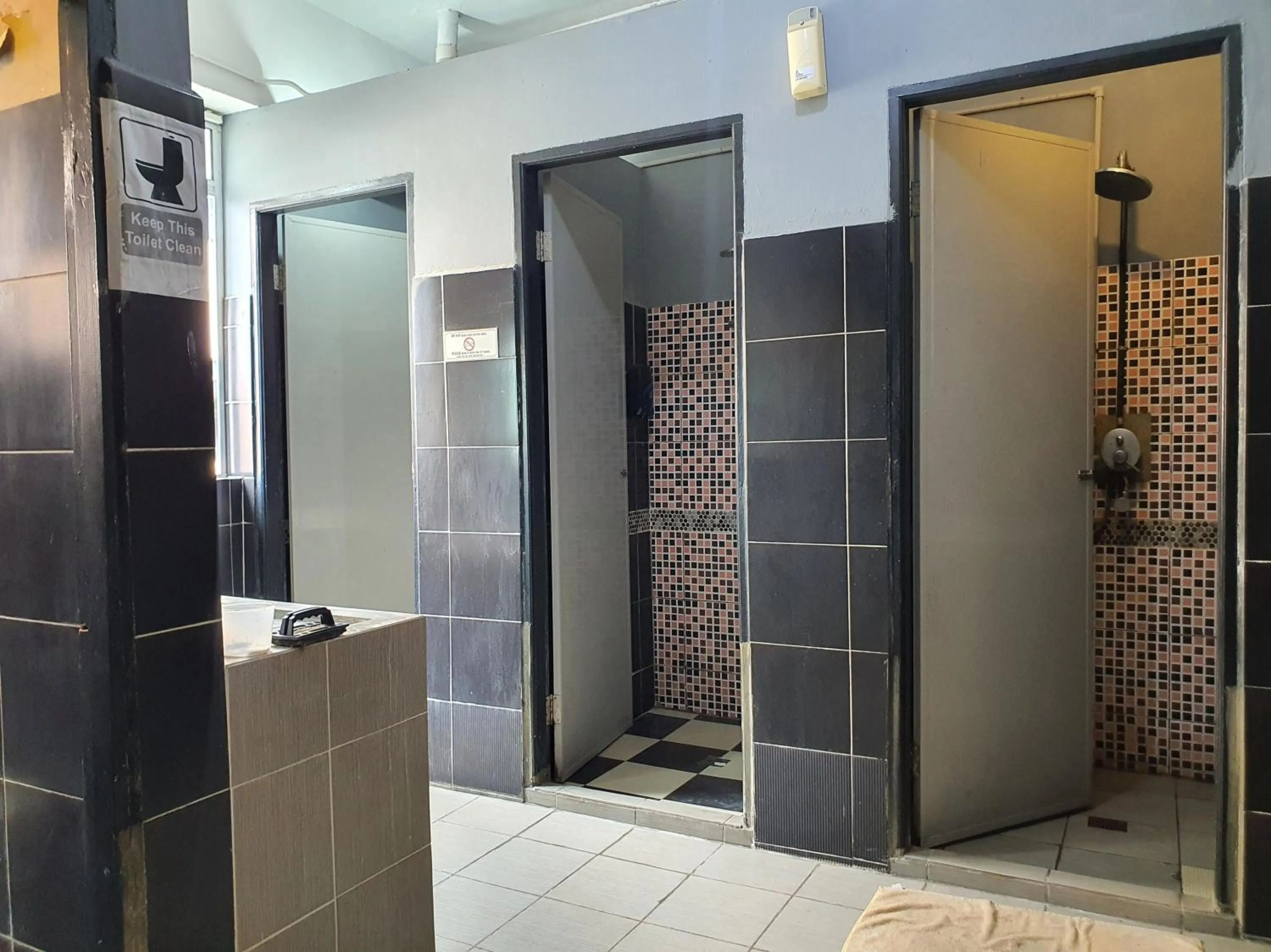 Bathroom in SPOT ON 90984 Gn Homestay