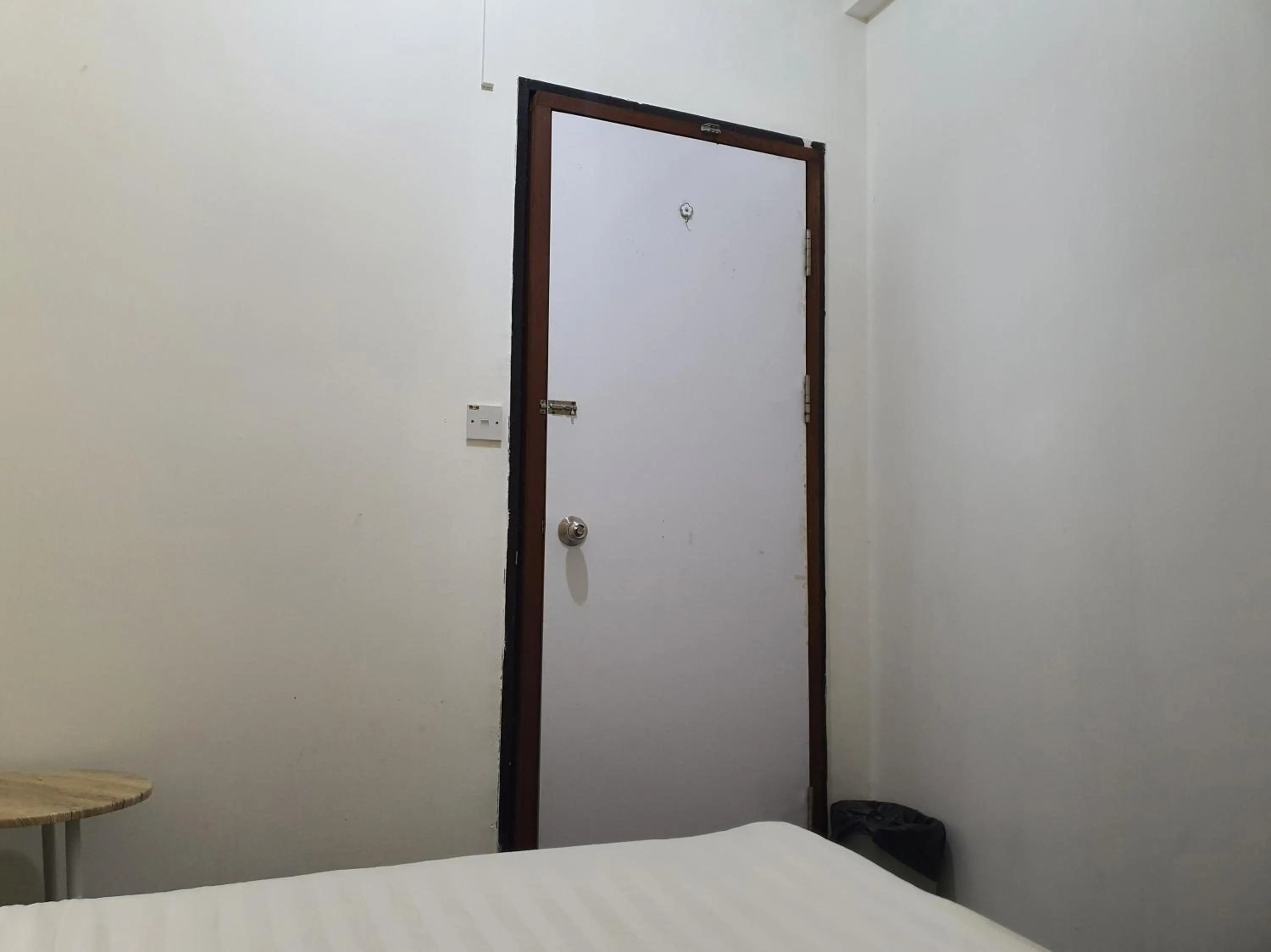 Bedroom in SPOT ON 90984 Gn Homestay