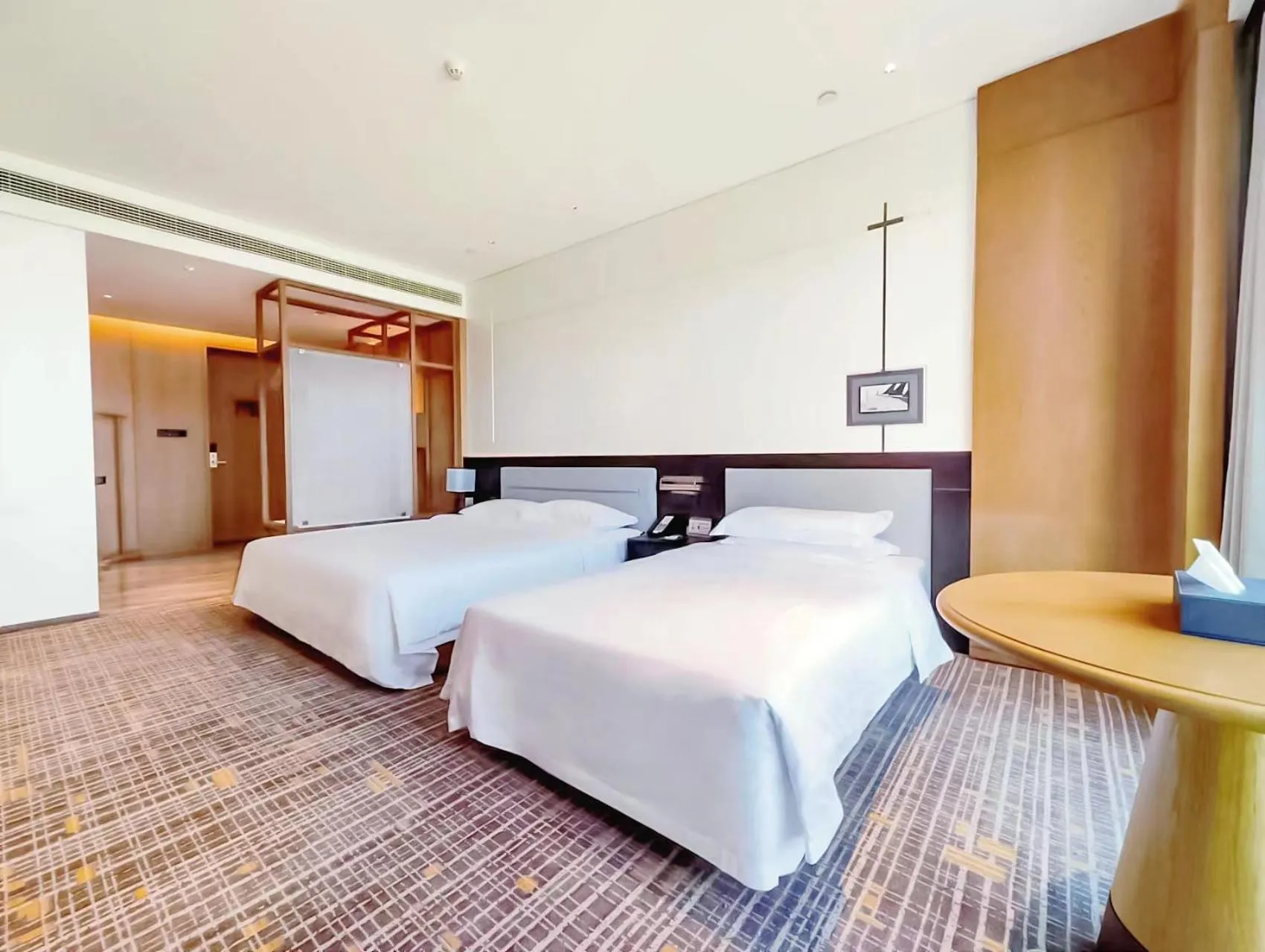 Bed in Holiday Inn Ningbo Xiangshan Damu Bay by IHG