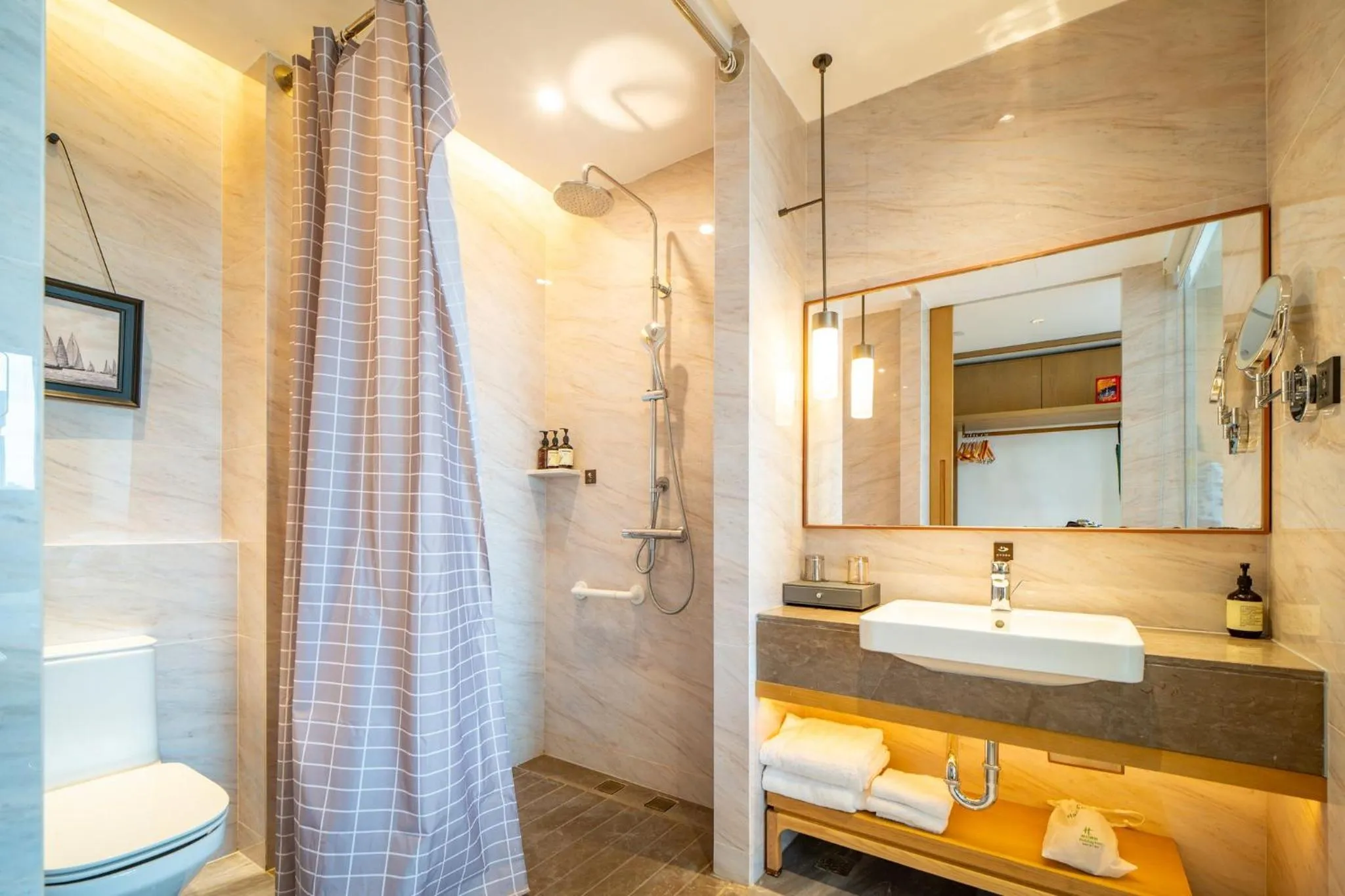 Bathroom in Holiday Inn Ningbo Xiangshan Damu Bay by IHG