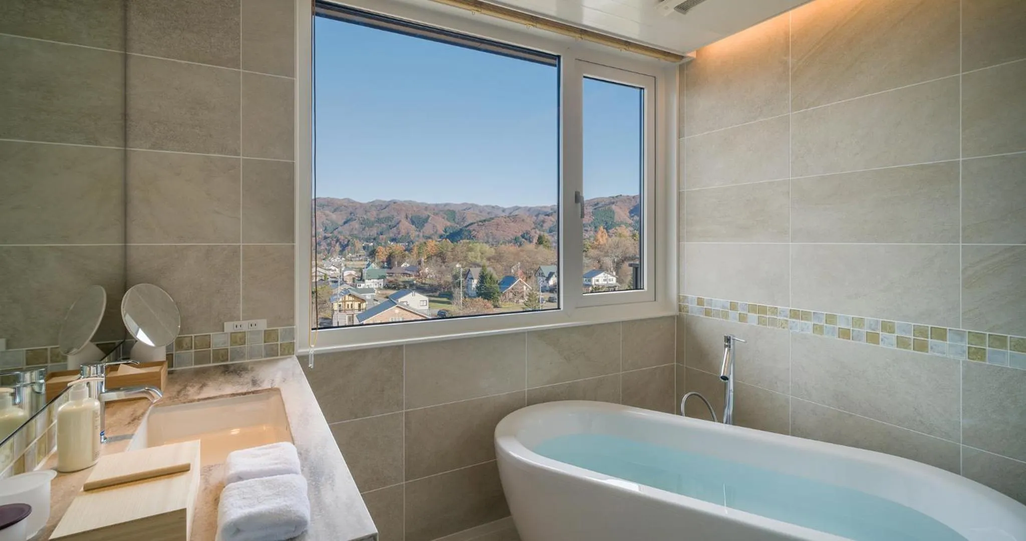 Bathroom in HOTEL LA VIGNE HAKUBA by Onko Chishin