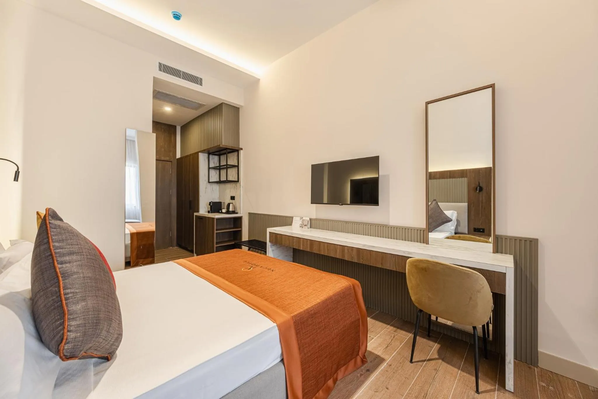 Photo of the whole room, Bed in Nuca Homes