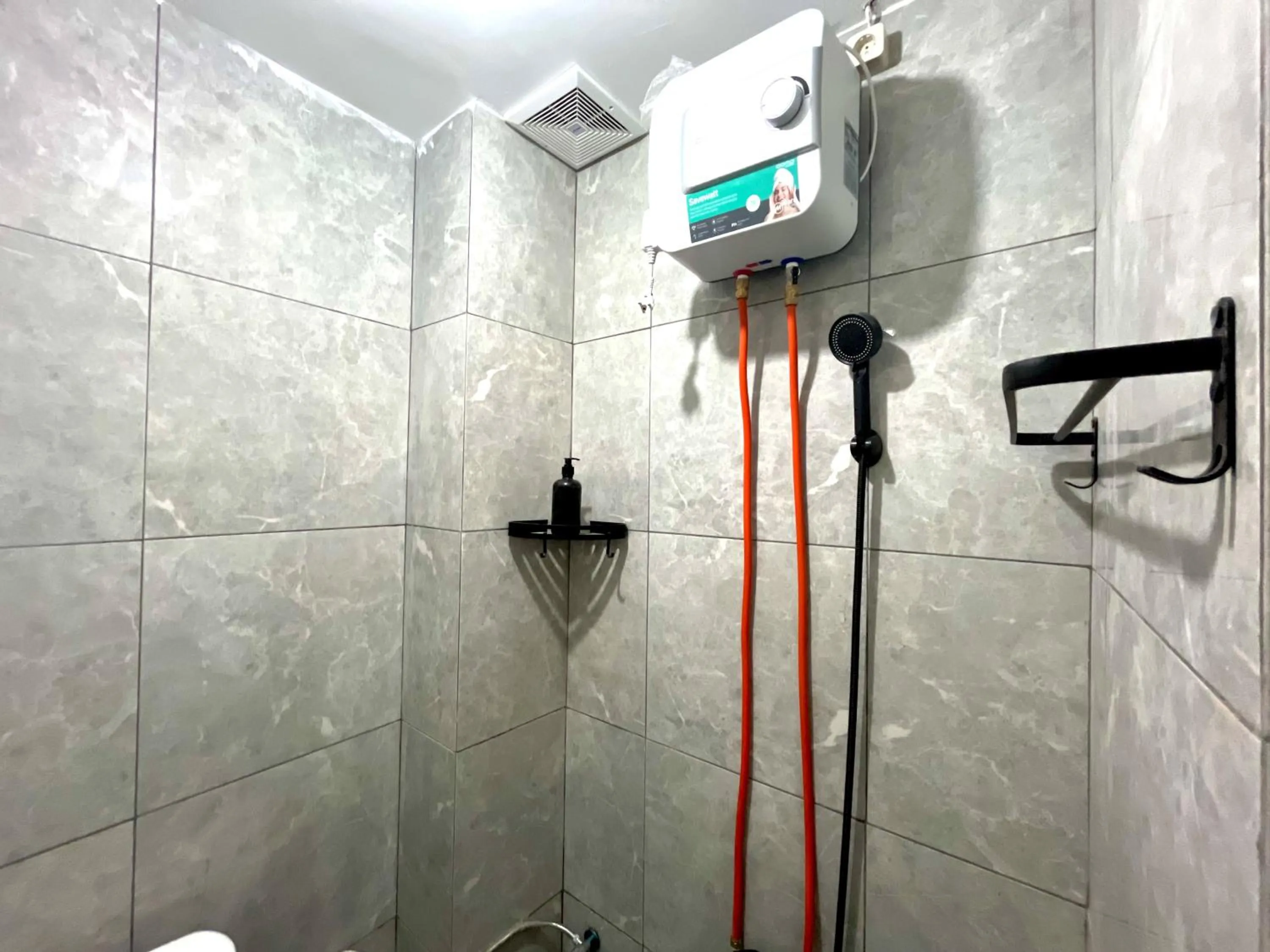 Bathroom in Urbanview De Path House Syariah Boyolali