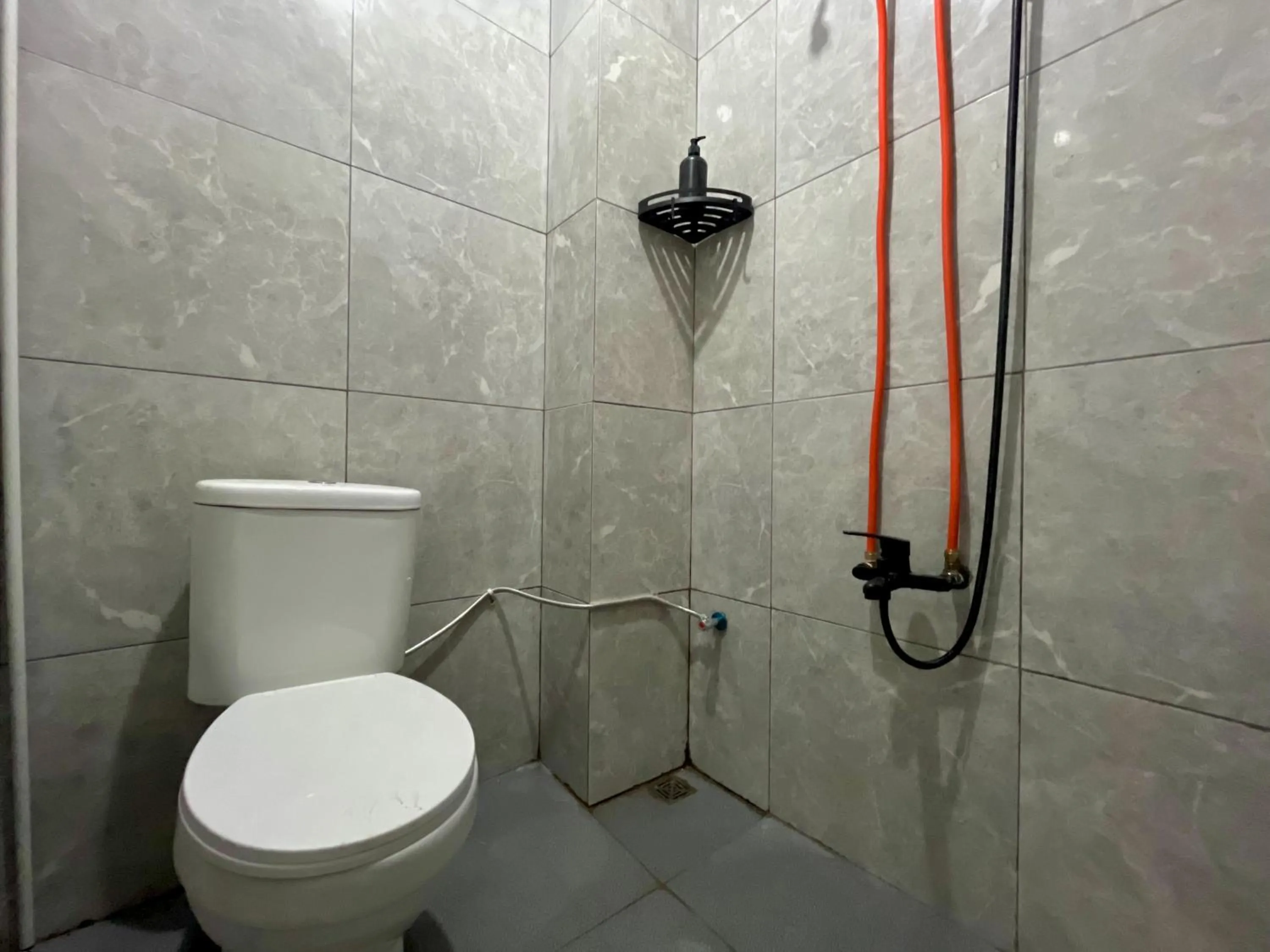 Bathroom in Urbanview De Path House Syariah Boyolali