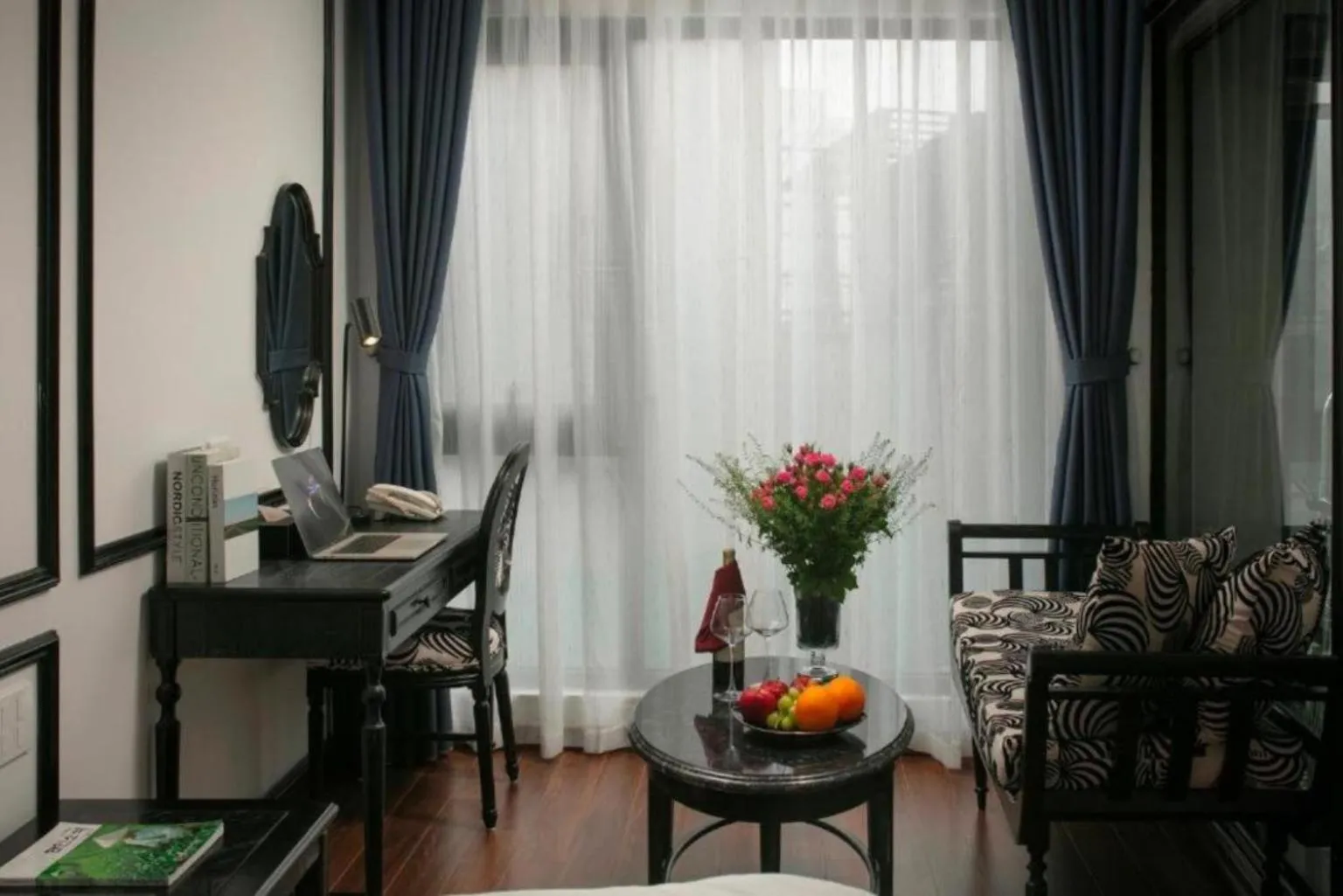 Seating area in Hanoi Le Chateau Hotel & Spa