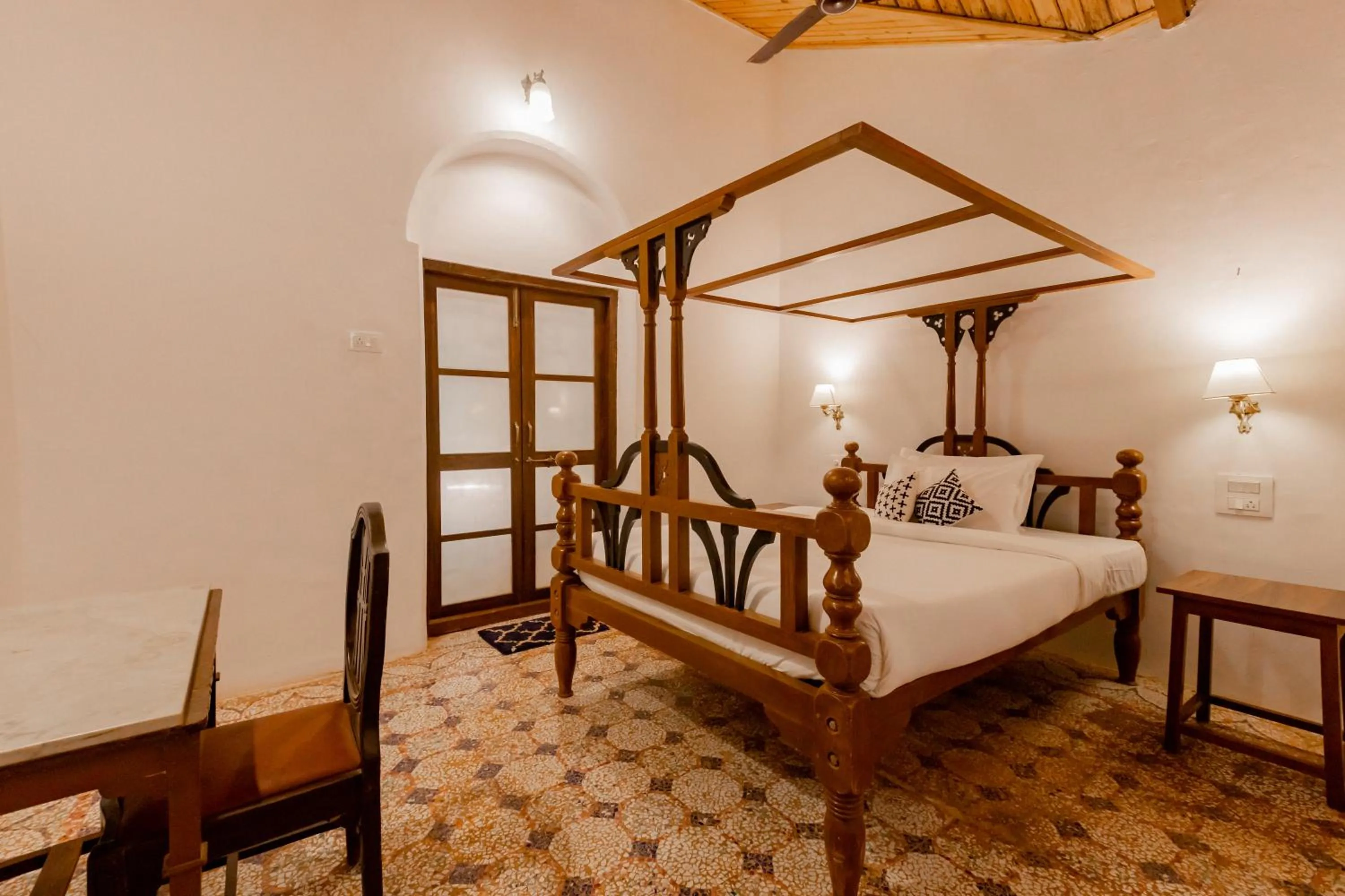 Bed in Radha Cottage Resort