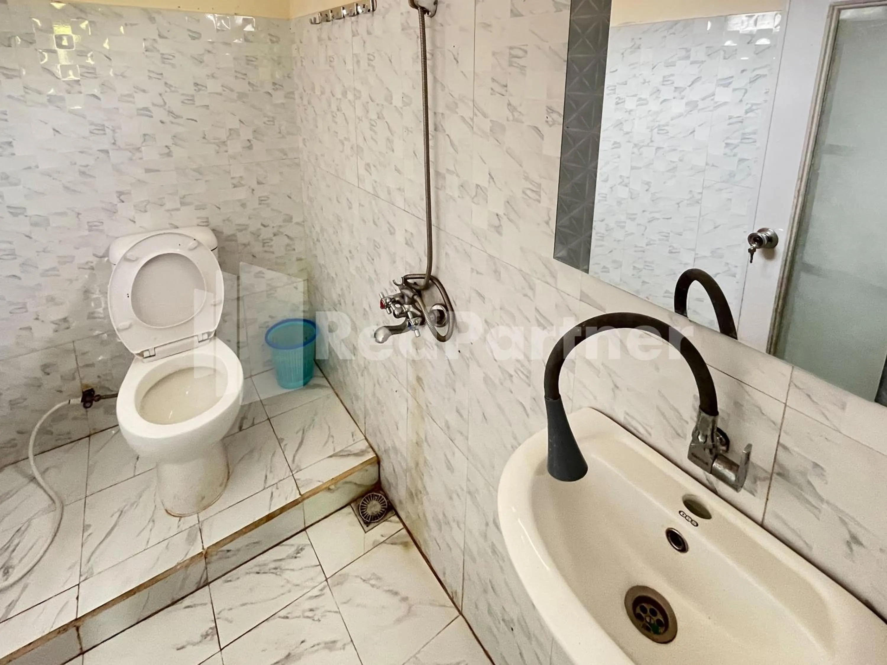 Bathroom in Family Homestay Syariah Bromo Mitra RedDoorz