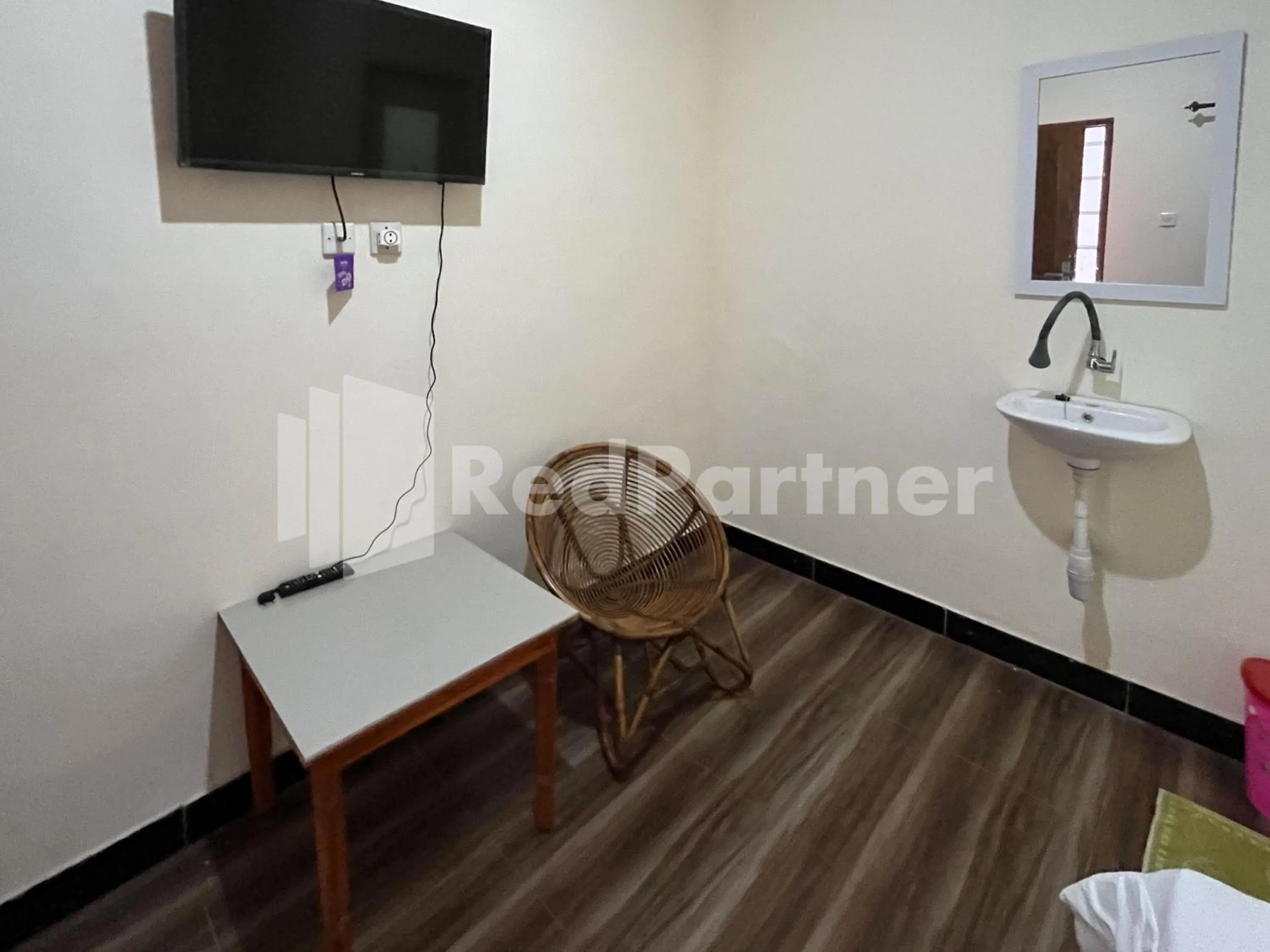 Bedroom in Family Homestay Syariah Bromo Mitra RedDoorz