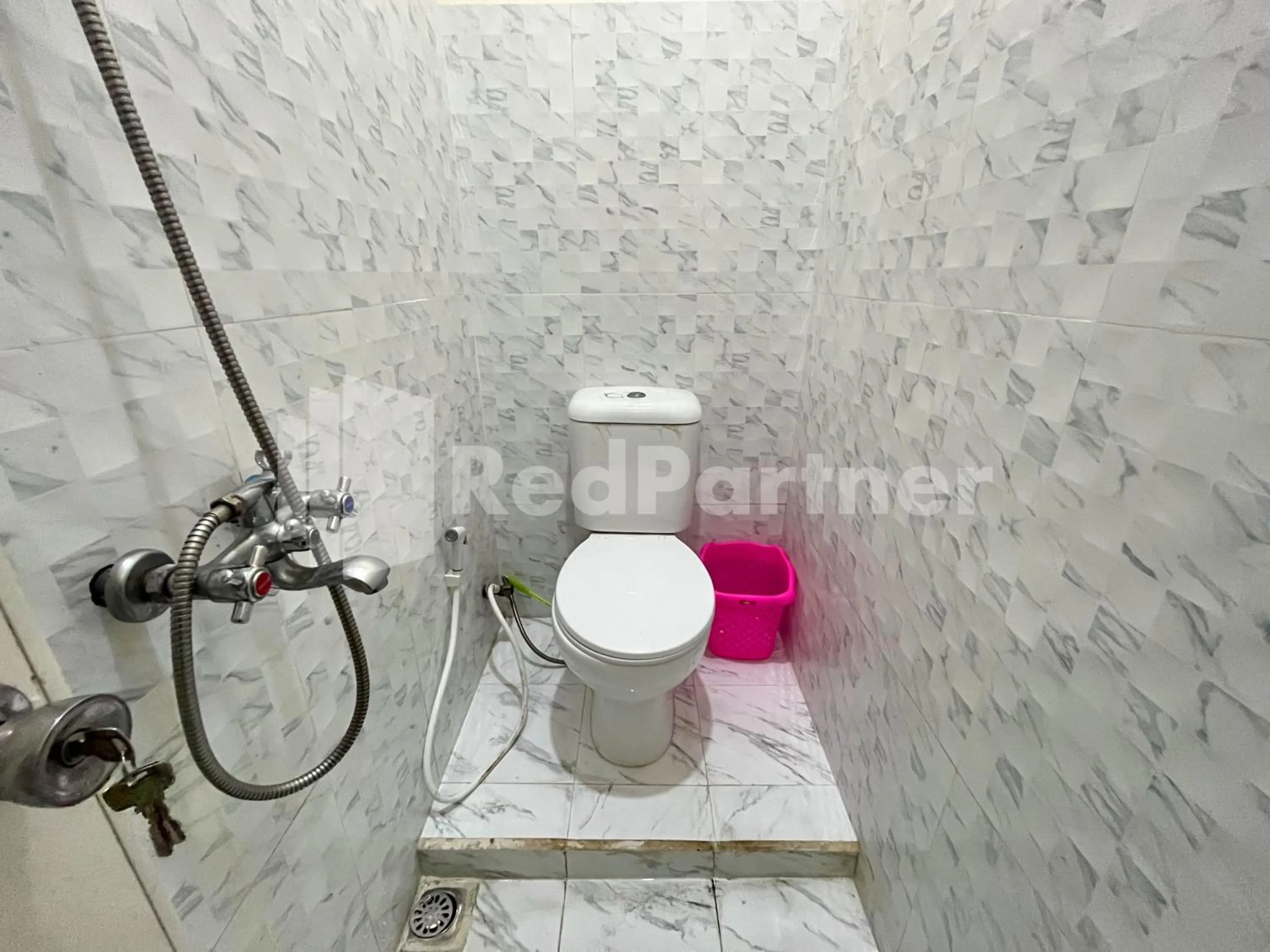 Bathroom in Family Homestay Syariah Bromo Mitra RedDoorz