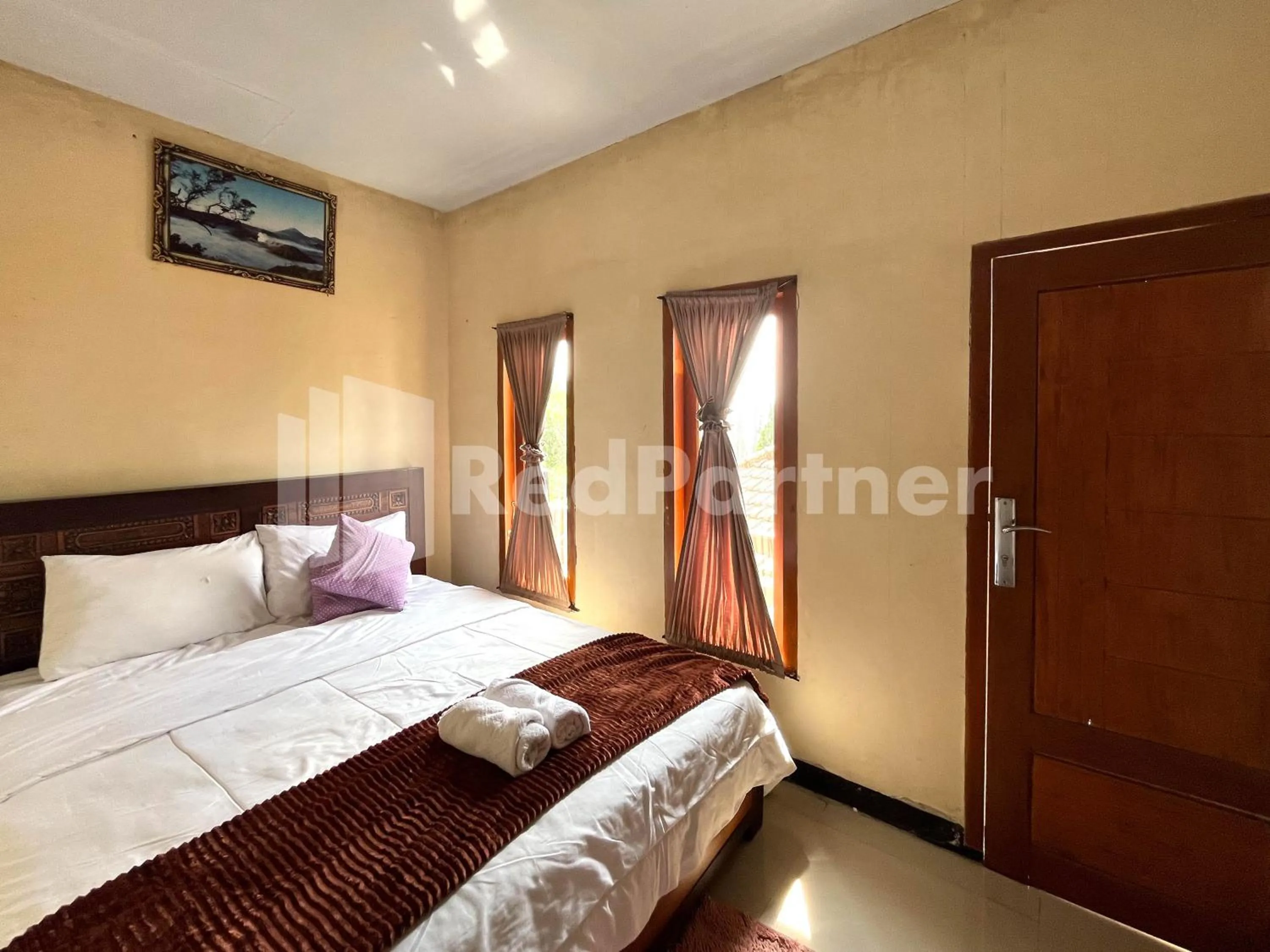 Bedroom, Bed in Family Homestay Syariah Bromo Mitra RedDoorz