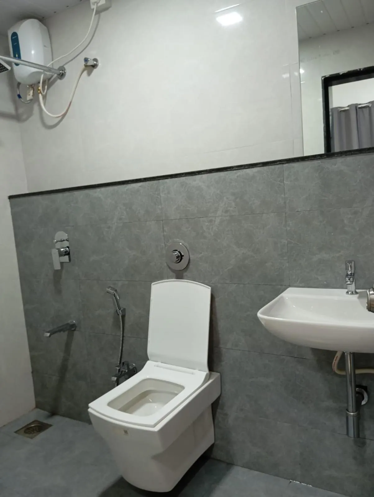 Toilet in Habitat Inn