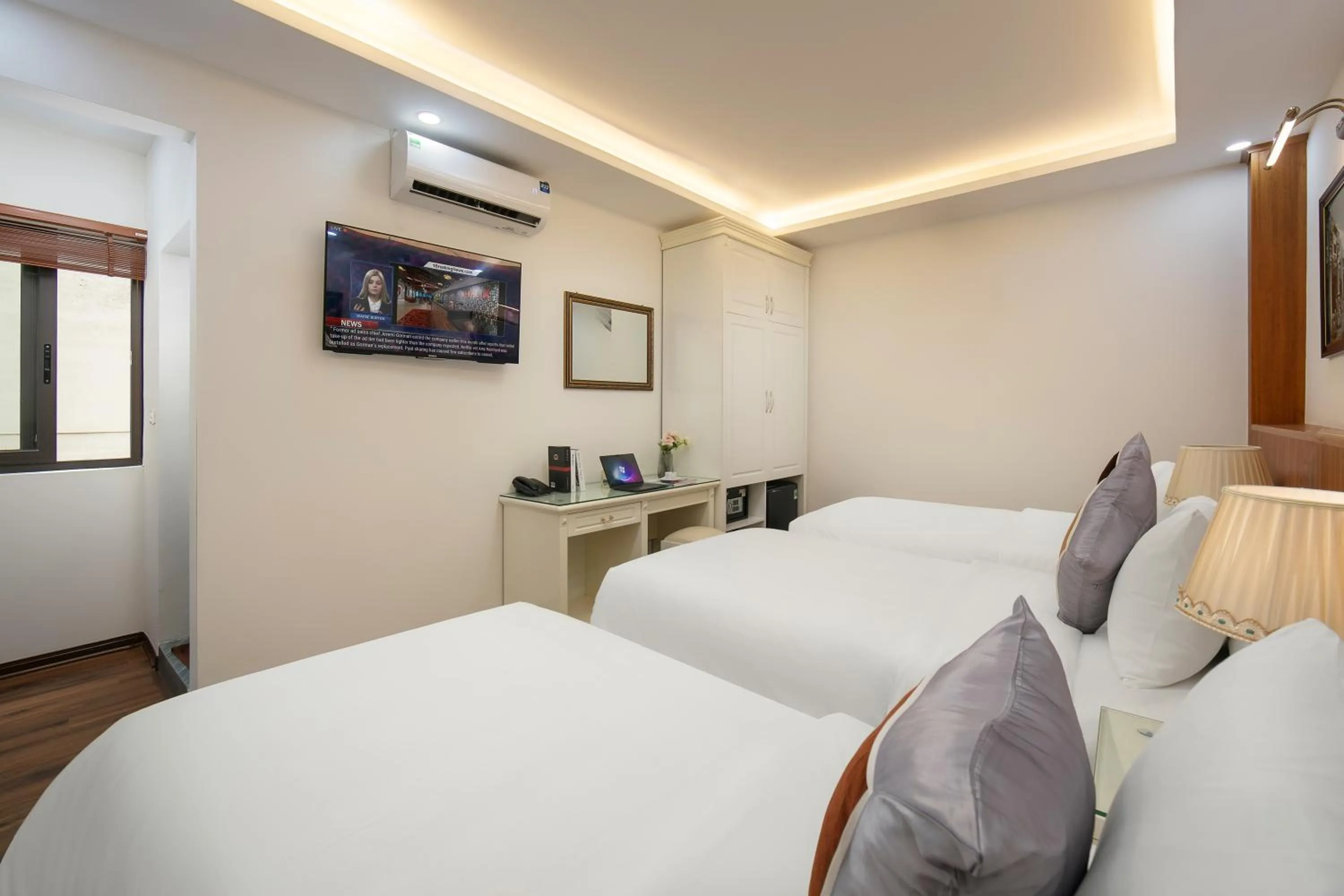 Bed in TrangTrang Luxury Hotel