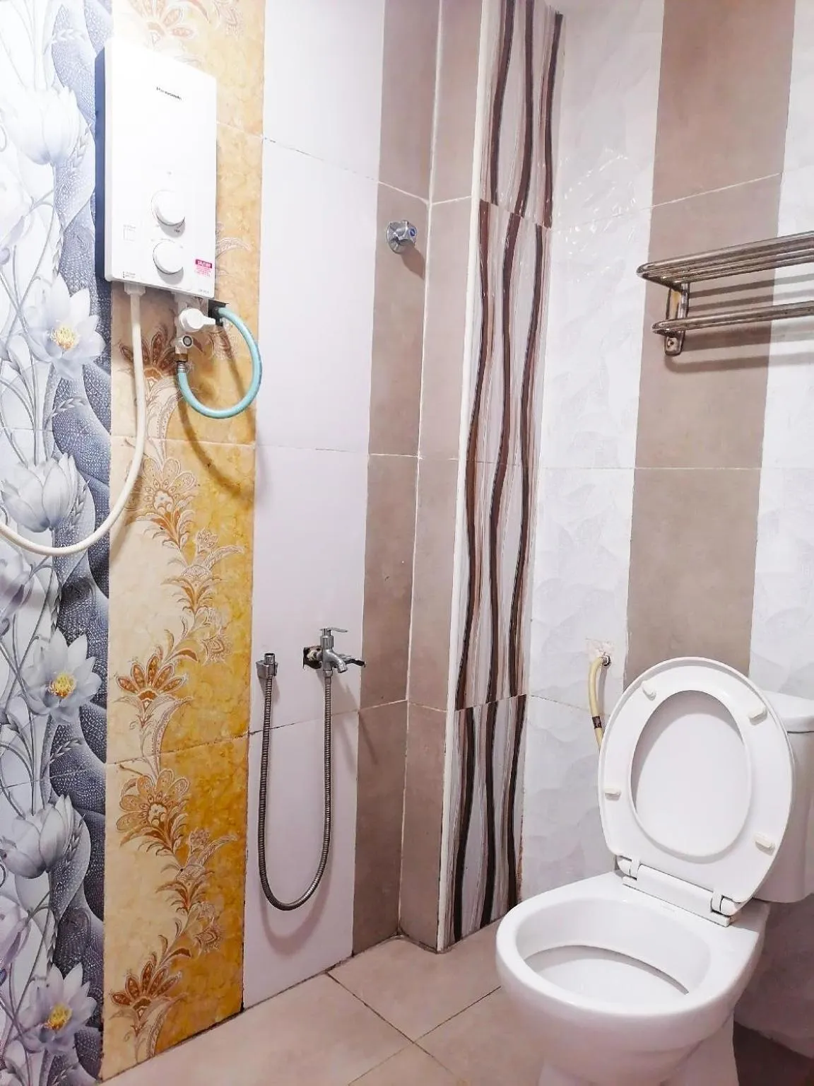 Toilet in DE GLORY HOTEL UsJ 21