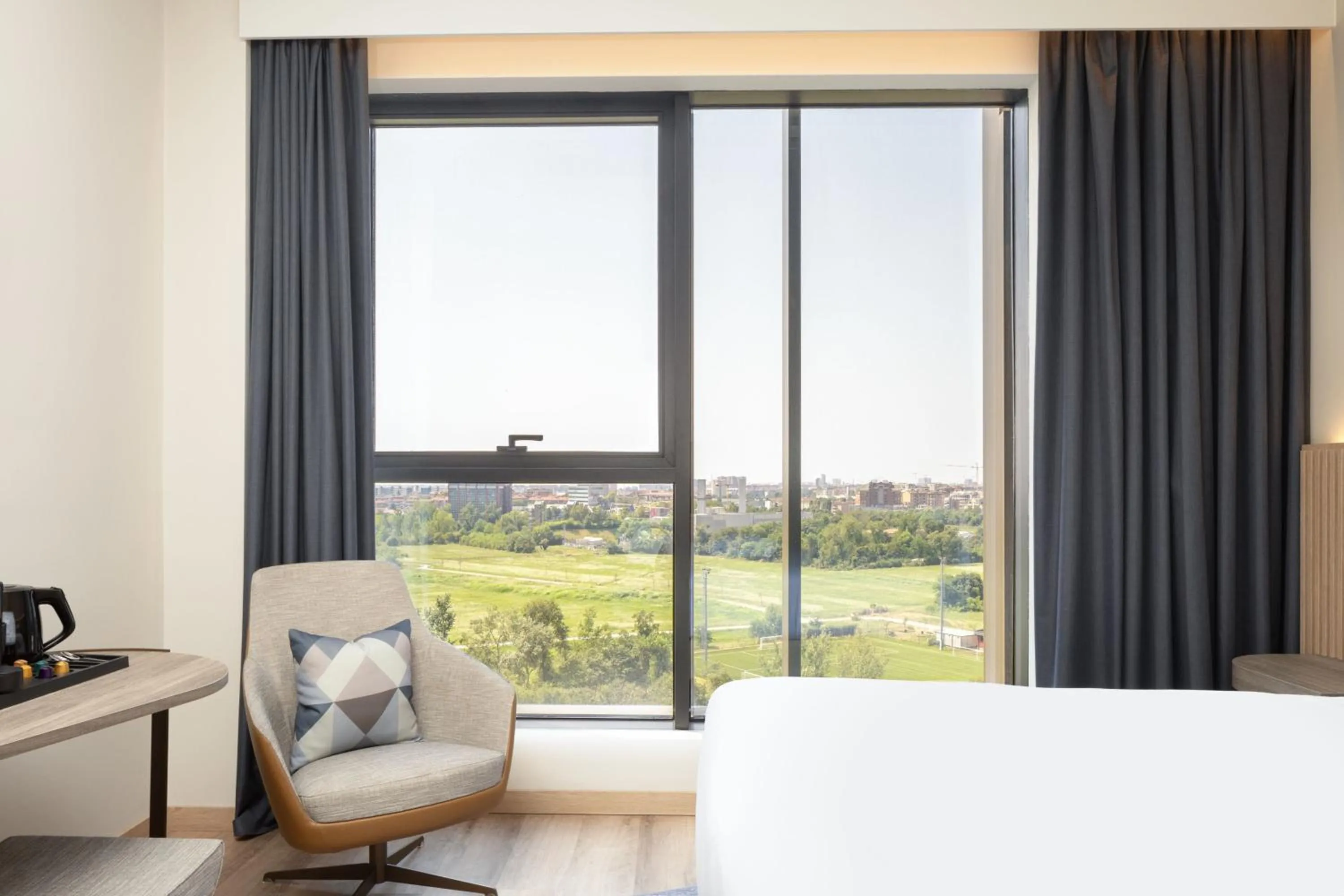 Photo of the whole room, Bed in Courtyard by Marriott Milano Linate