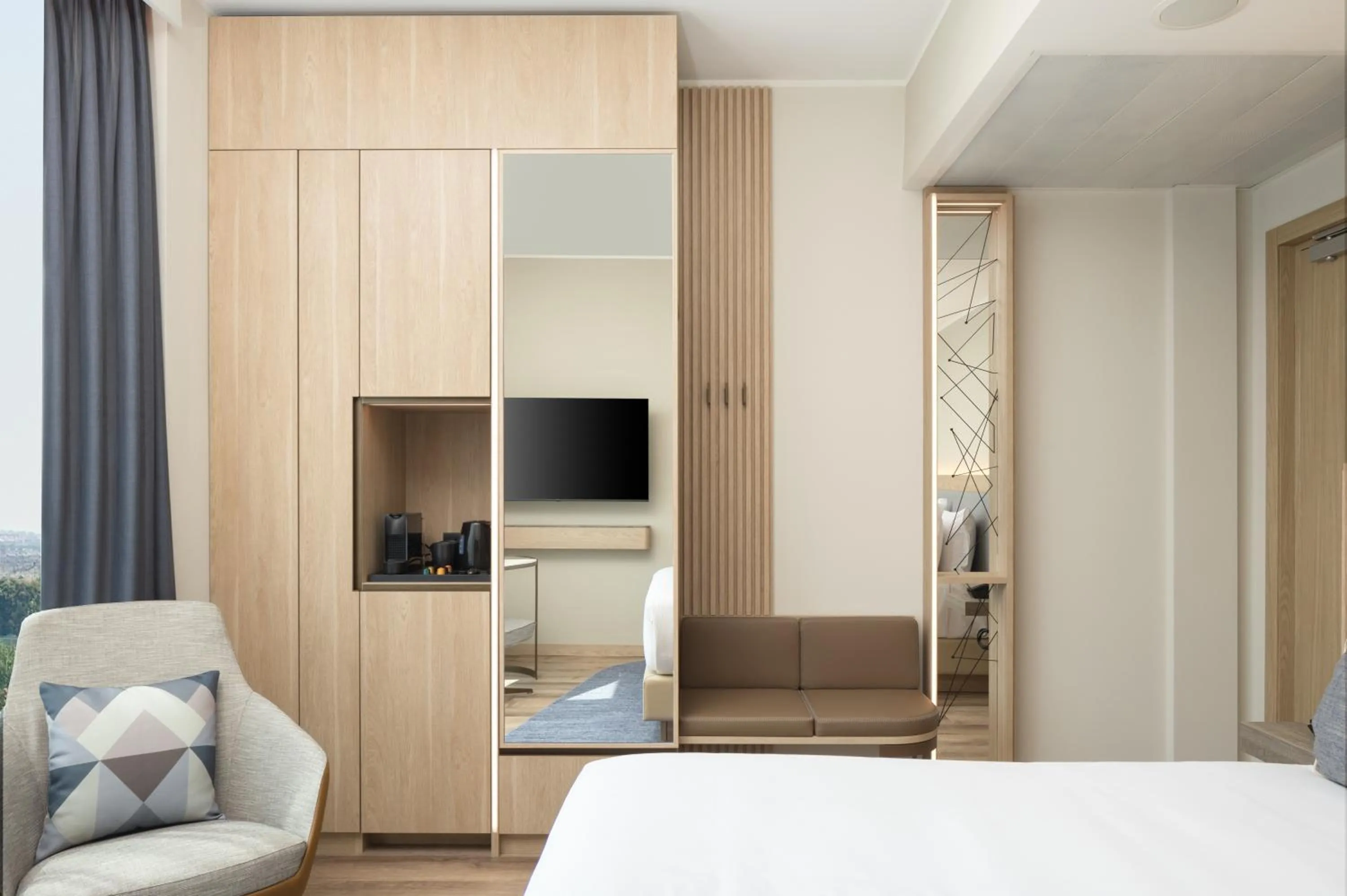 Communal lounge/ TV room, Bed in Courtyard by Marriott Milano Linate