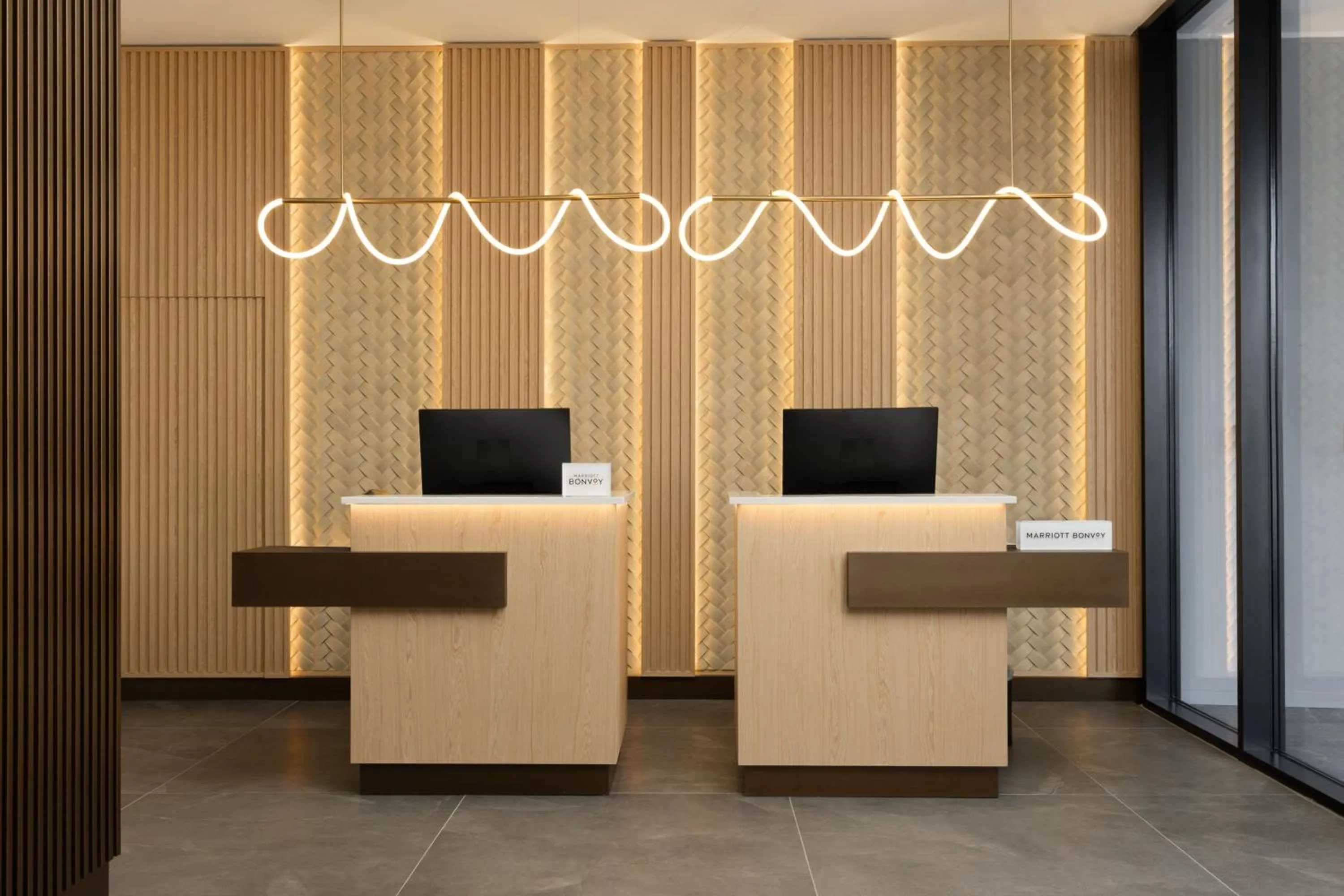 Lobby or reception in Courtyard by Marriott Milano Linate