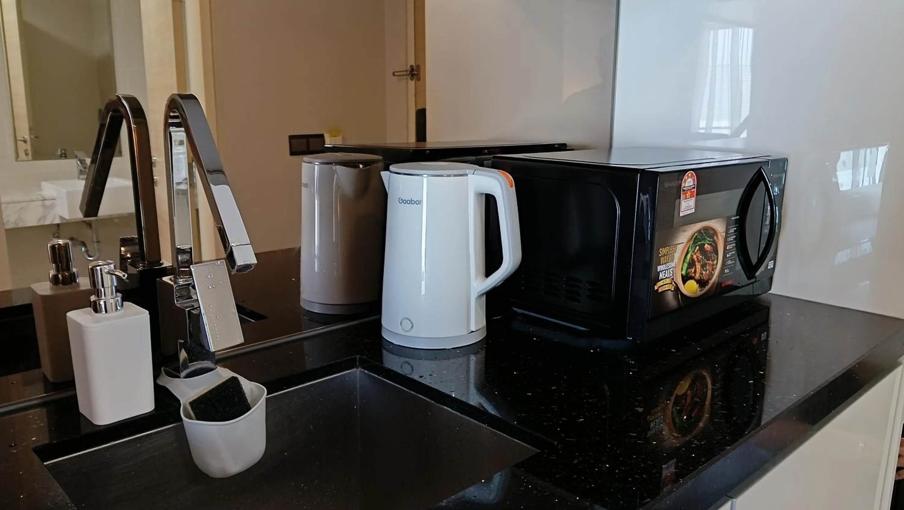 Kitchen or kitchenette in The Straits Suites by Ciconia