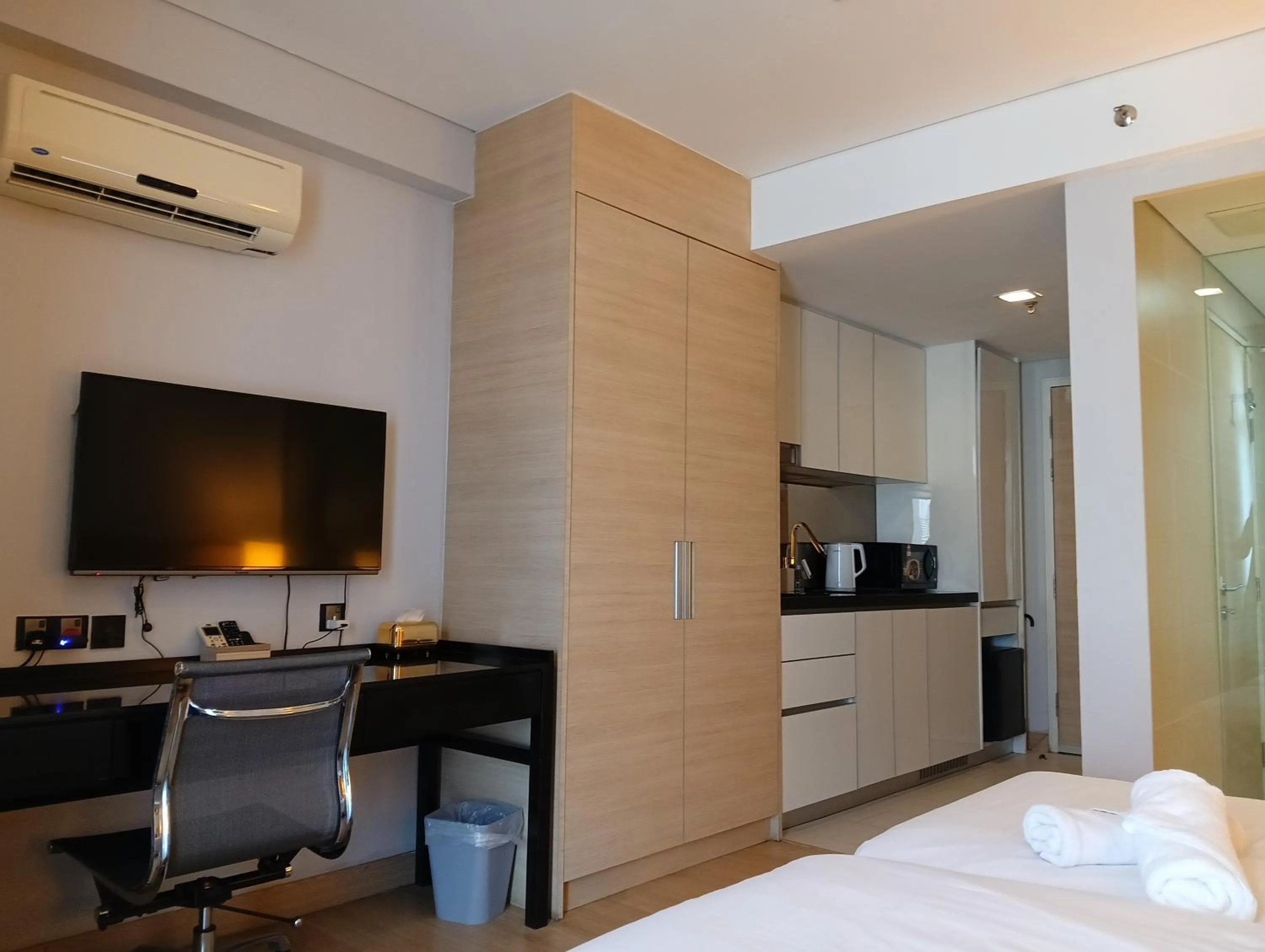 wardrobe, Bed in The Straits Suites by Ciconia