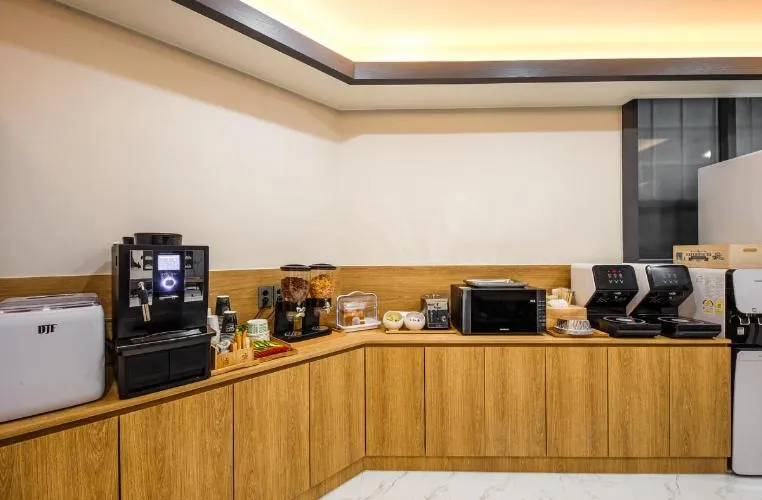 Kitchen or kitchenette in Hotel Lion