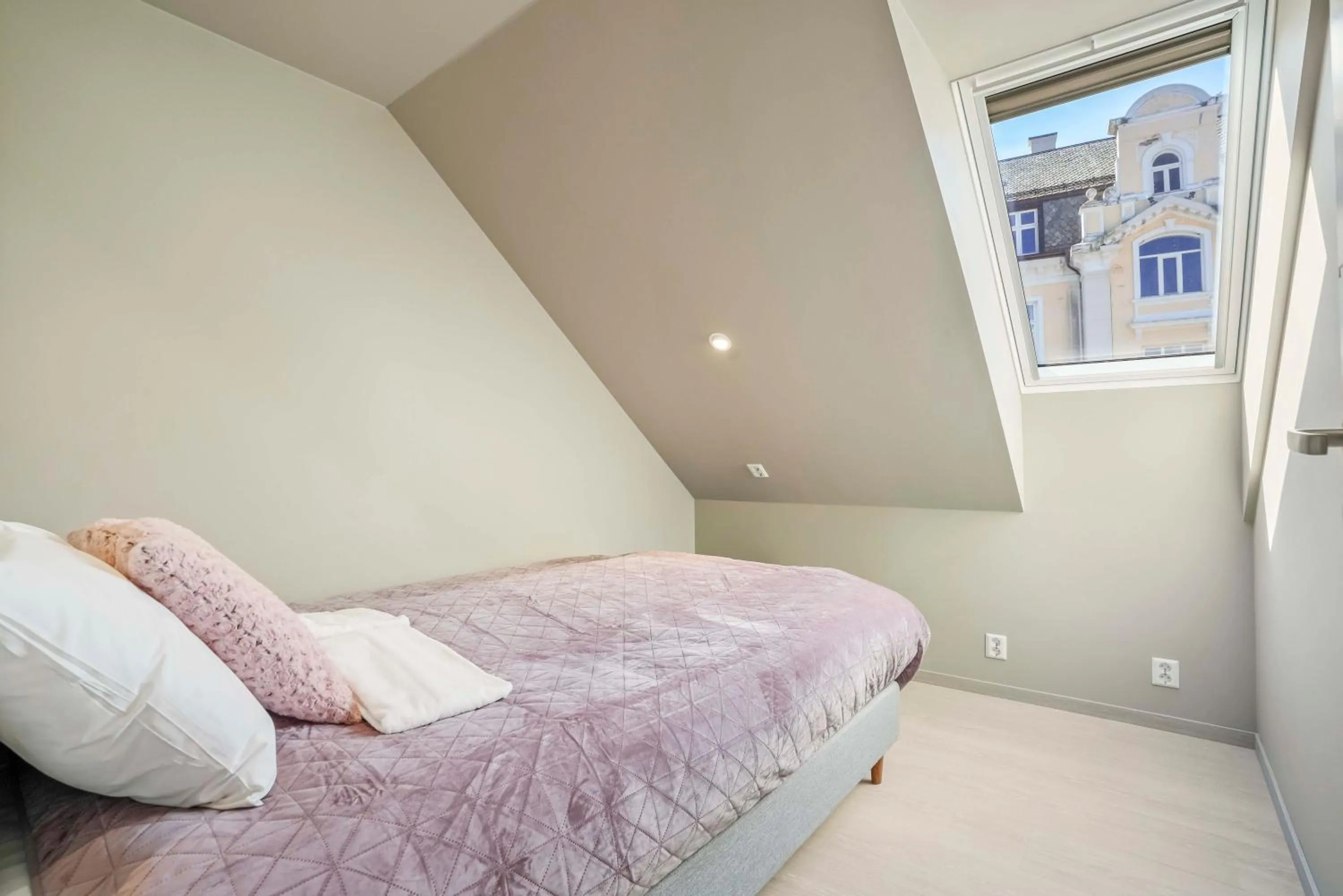 Bed in Florø Apartments Hotell