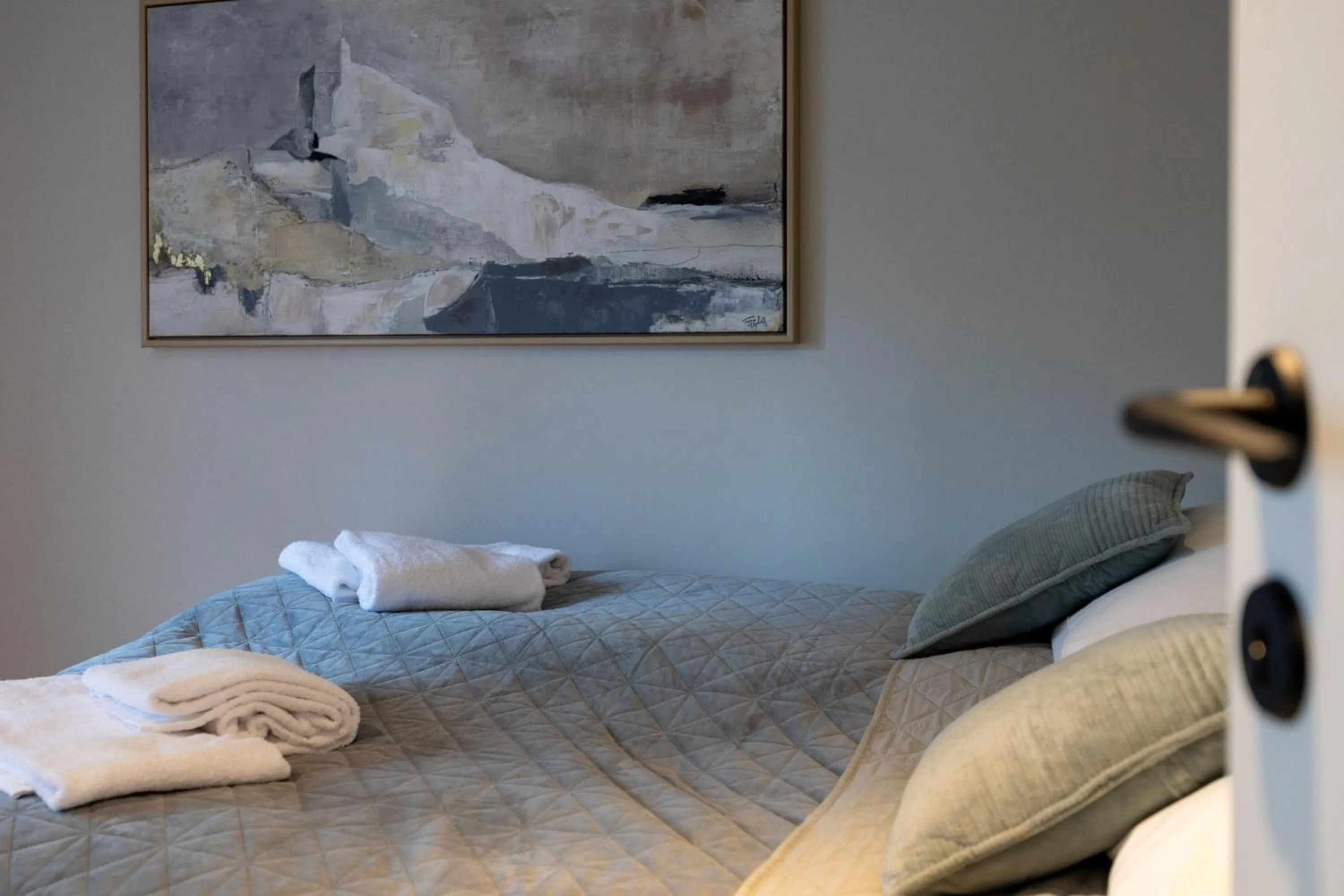 Bed in Florø Apartments Hotell