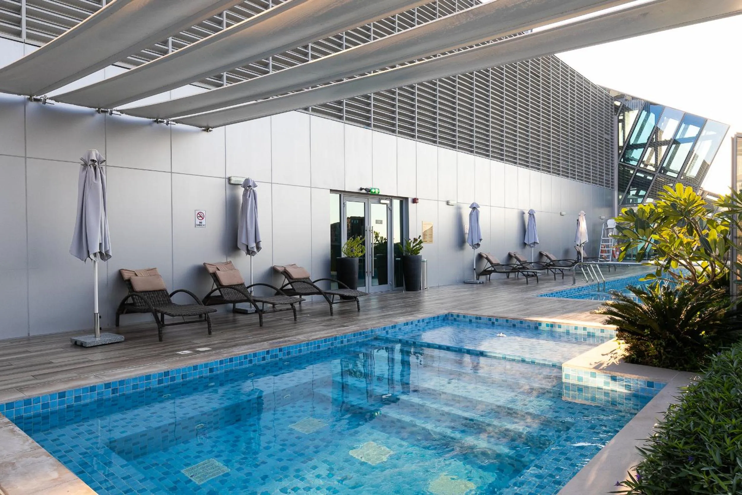 Swimming pool in GLOBALSTAY J One Tower Apartments at Pearl of UAE