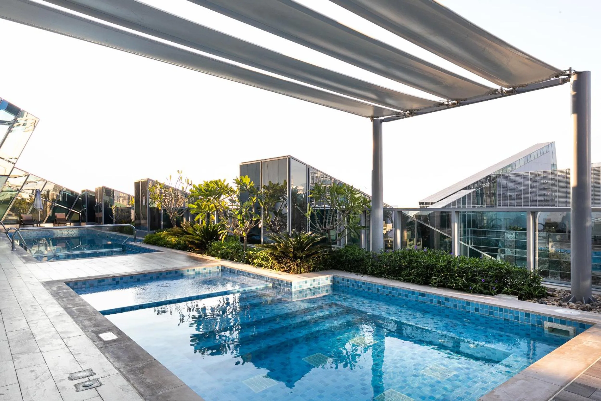 Swimming pool in GLOBALSTAY J One Tower Apartments at Pearl of UAE