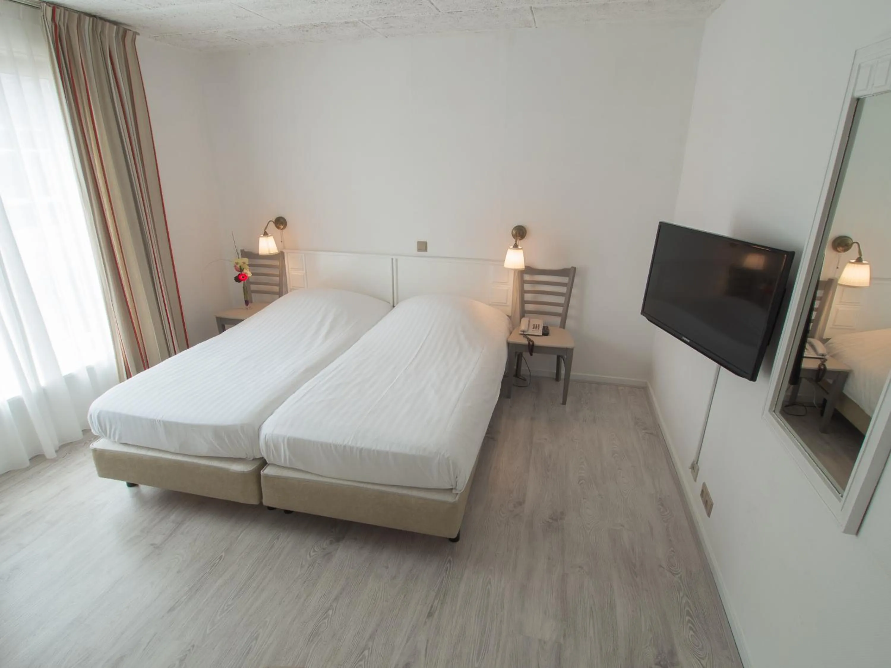 Bed in Stadshotel de Graafschap