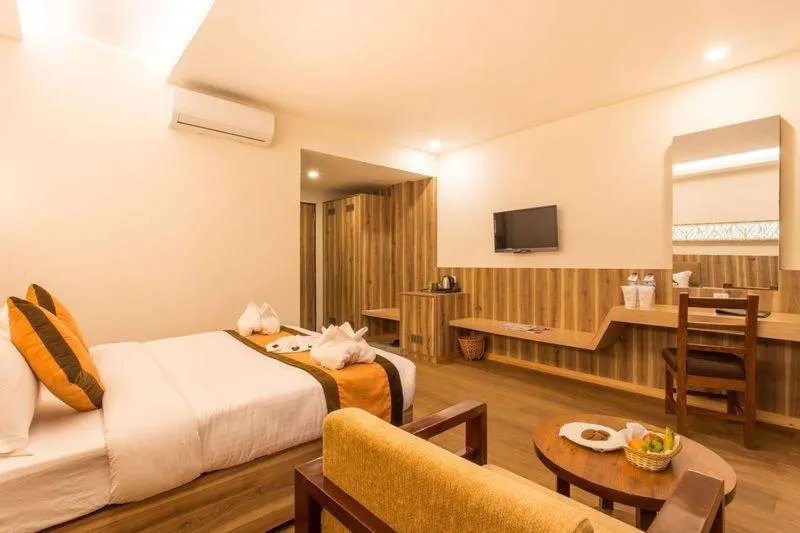 Bed in Park Safari Resort, Chitwan National Park