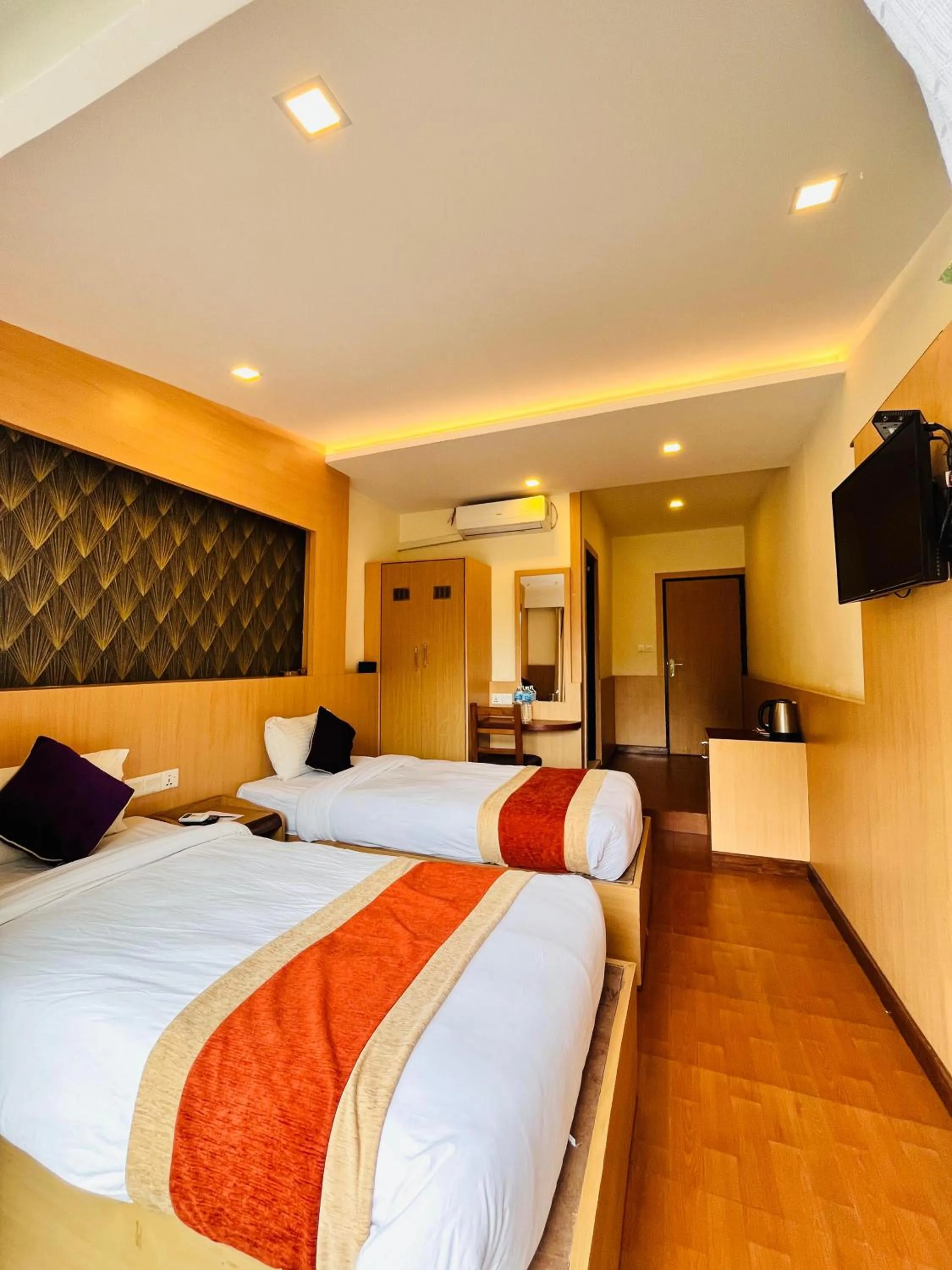 Bed in Park Safari Resort, Chitwan National Park