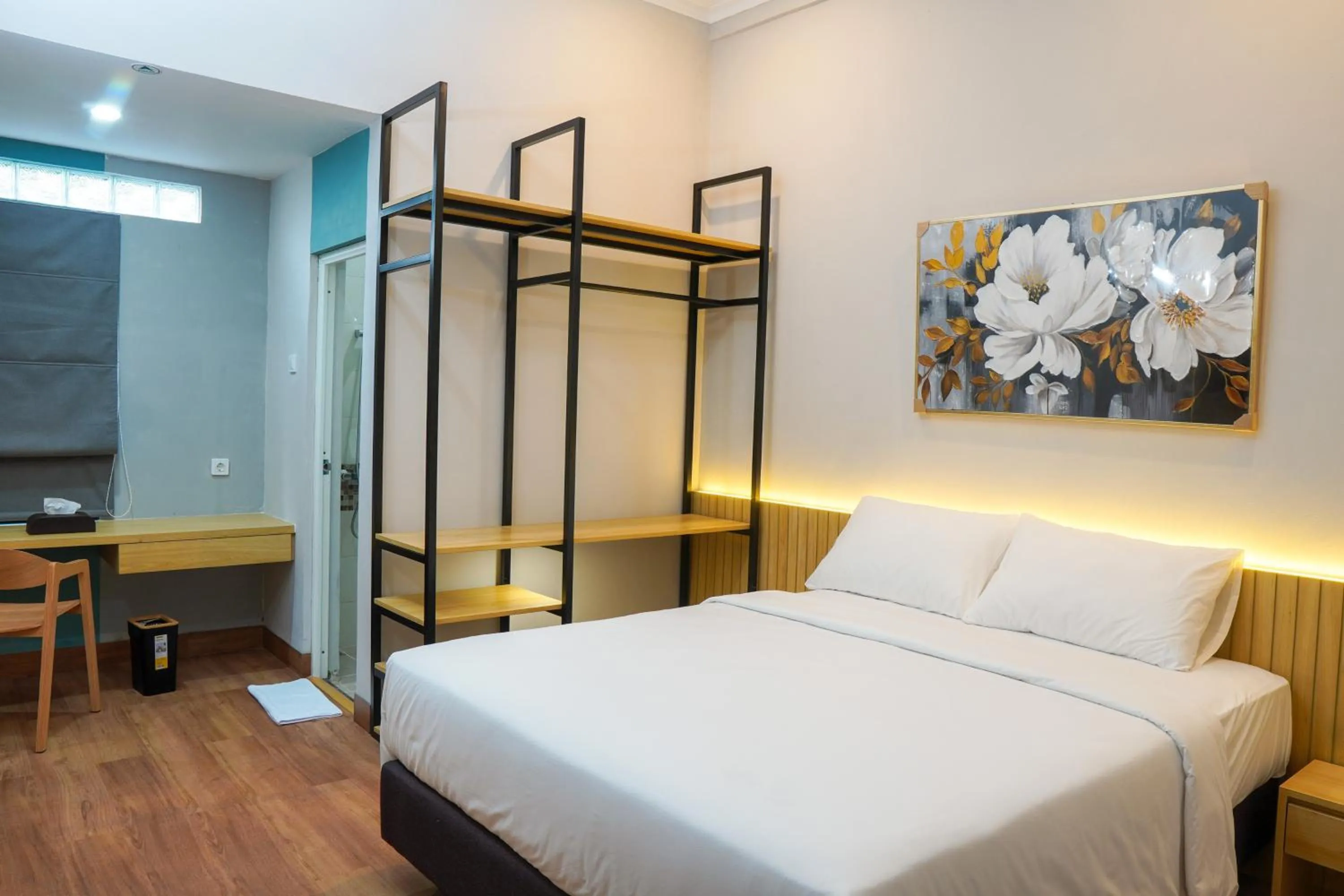 Bed in Ardiana Suite Hotel By Sajiwa