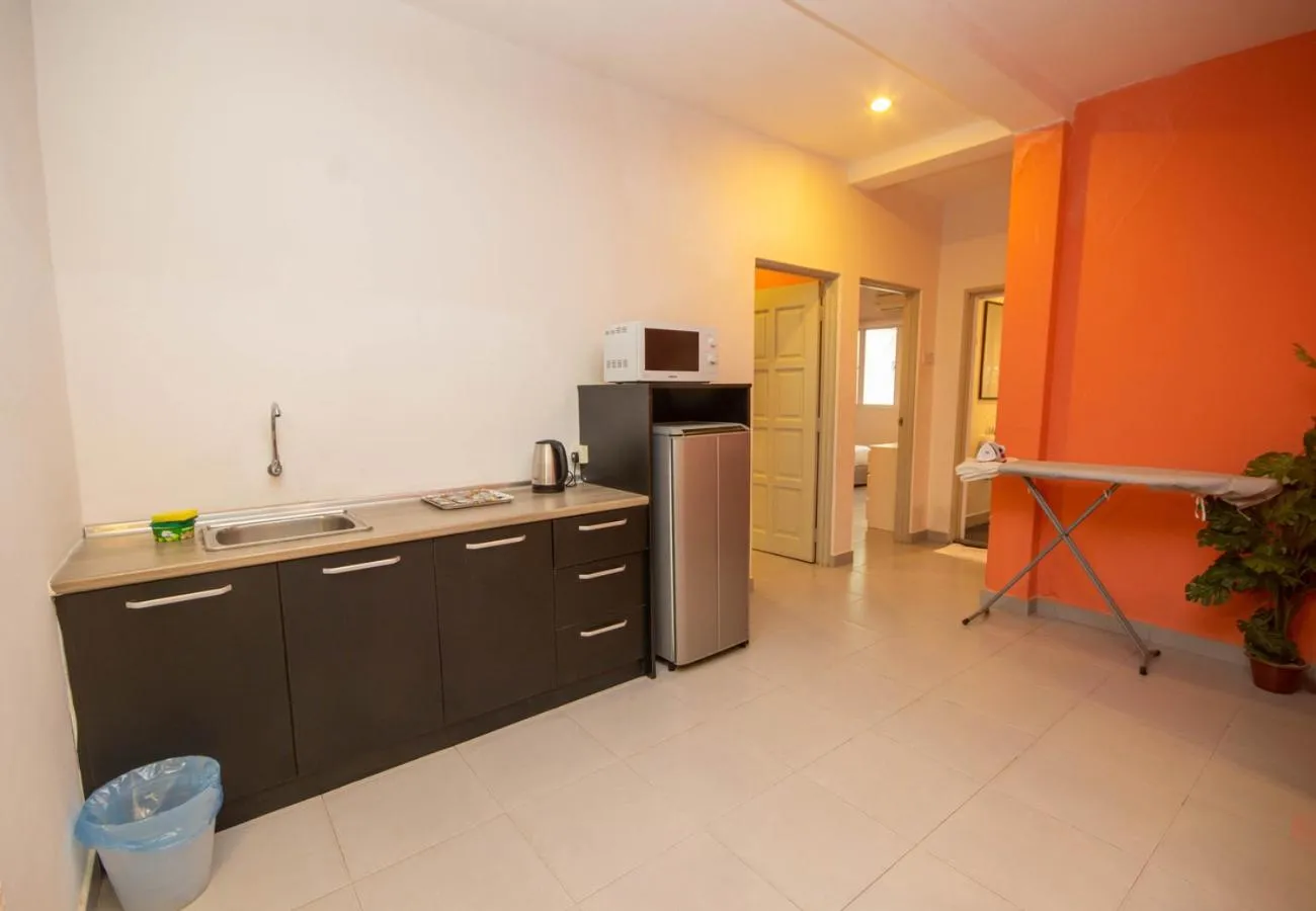 Kitchen or kitchenette in JQ Osborne Apartment