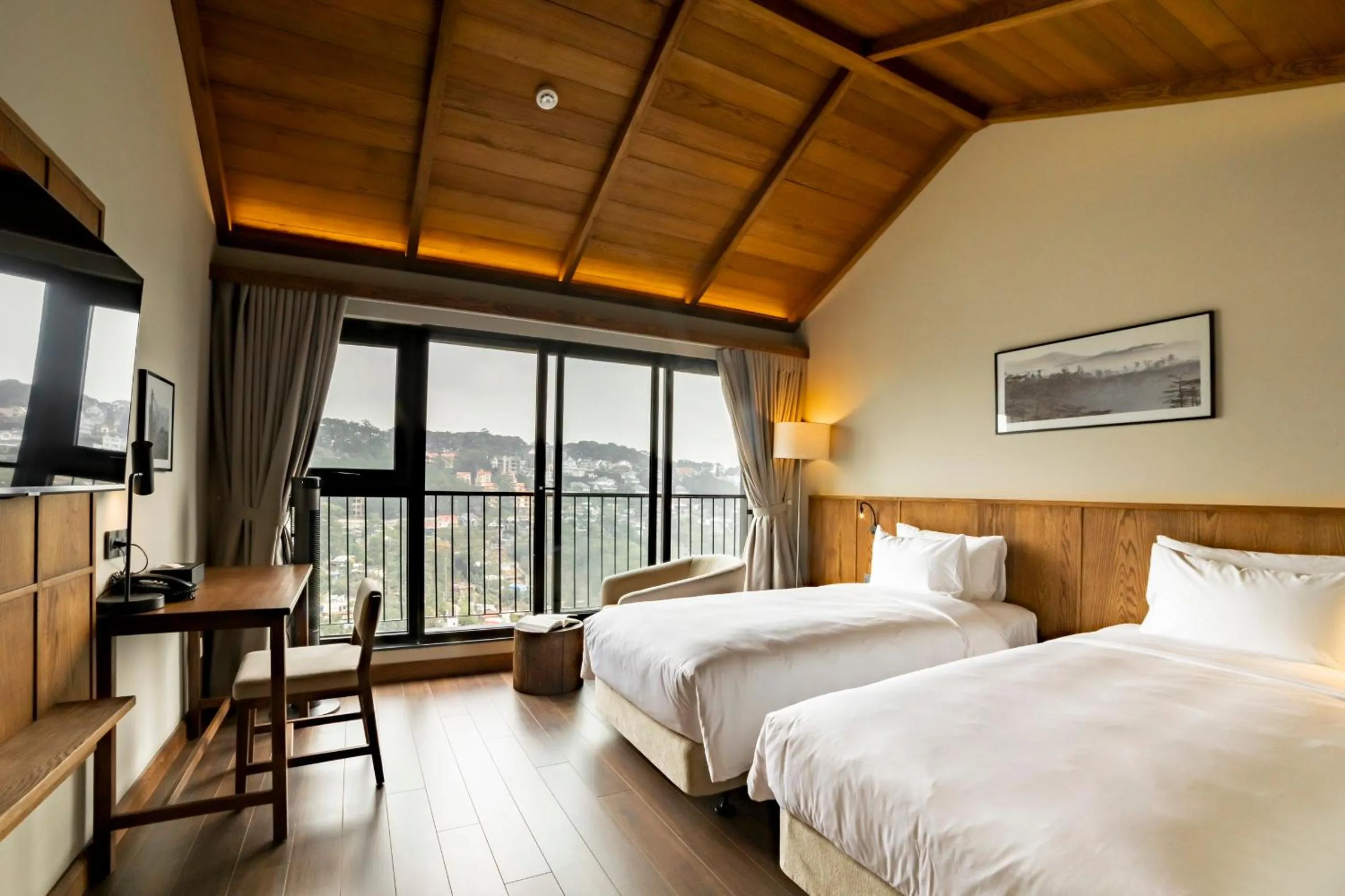 Communal lounge/ TV room, Bed in HLS Dalat Lodge