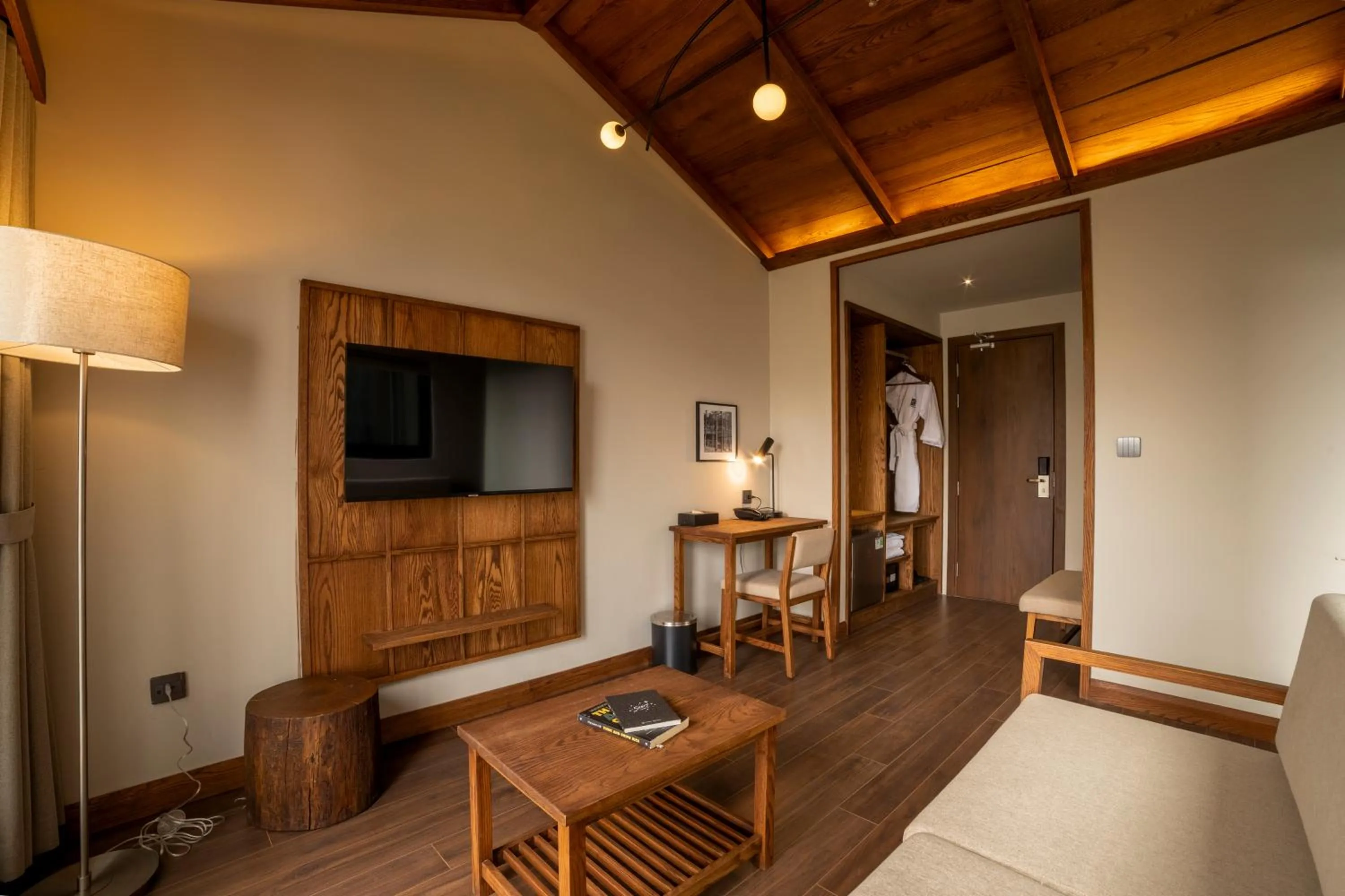 Communal lounge/ TV room in HLS Dalat Lodge