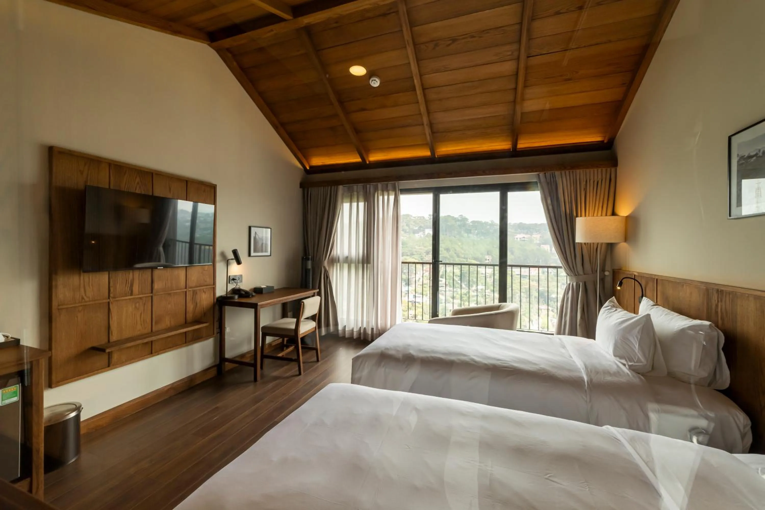 Communal lounge/ TV room, Bed in HLS Dalat Lodge