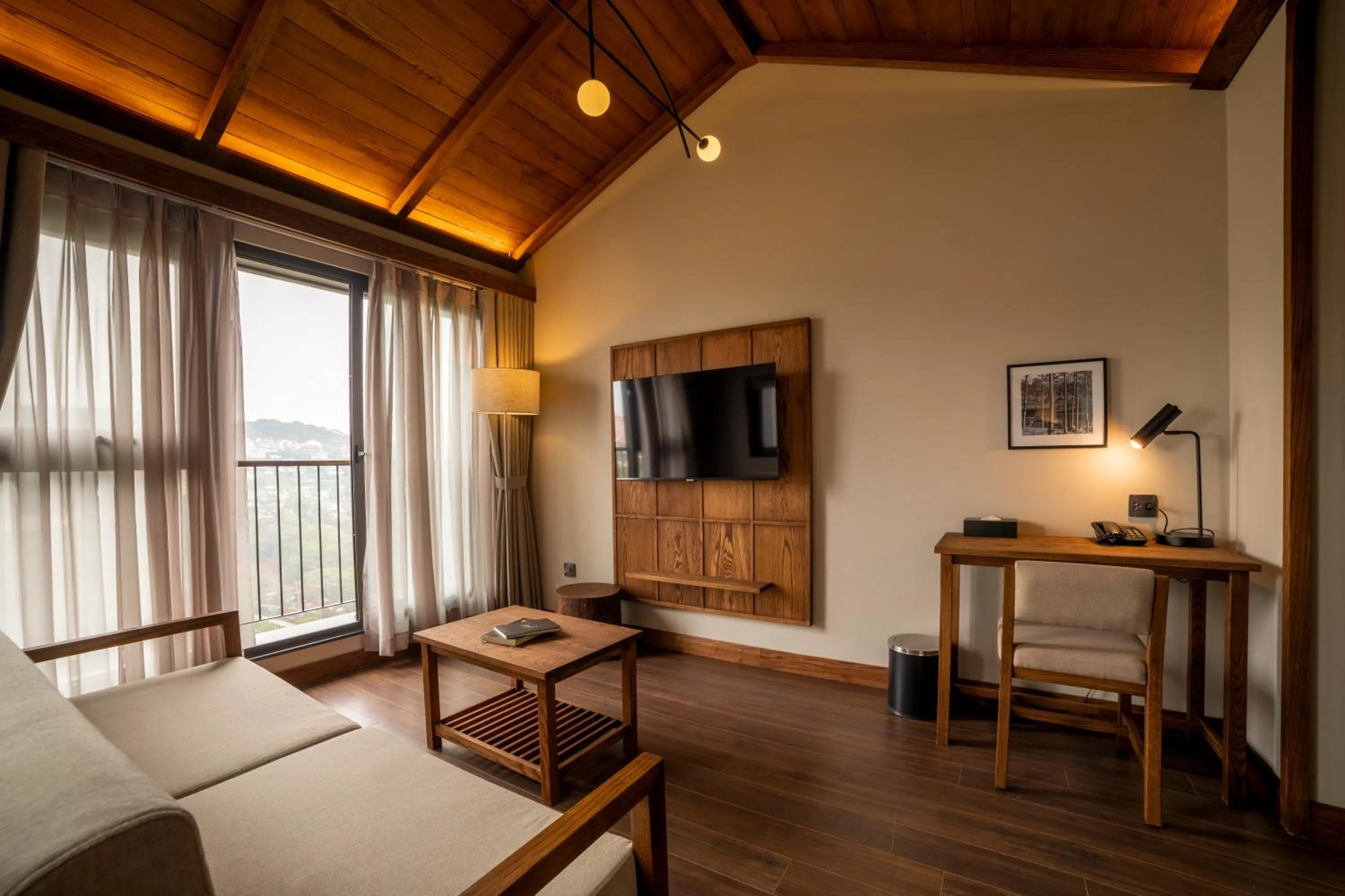 Communal lounge/ TV room in HLS Dalat Lodge