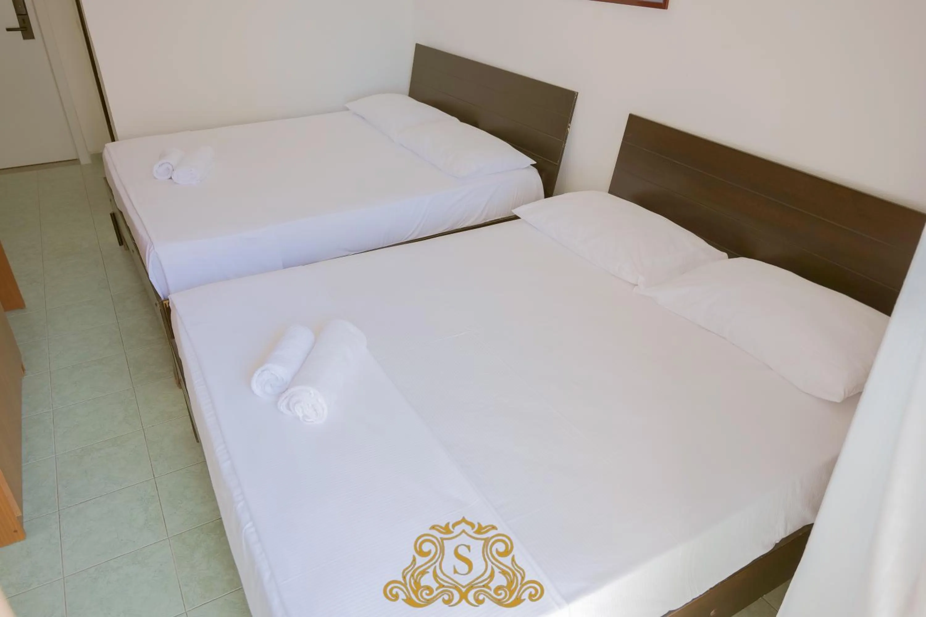 Bed in Hotel Sorrente