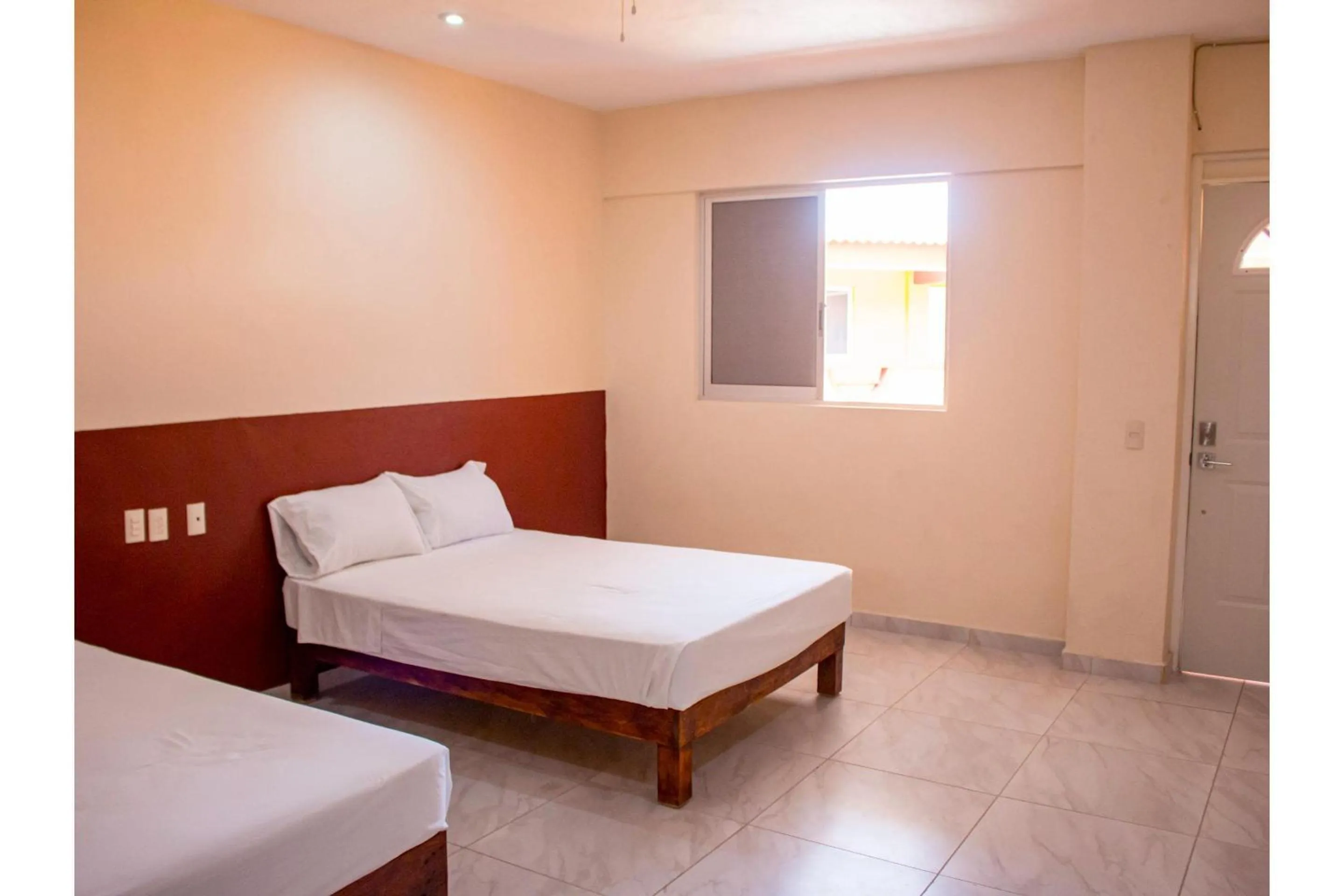 Bedroom, Bed in OYO Hotel La Playa