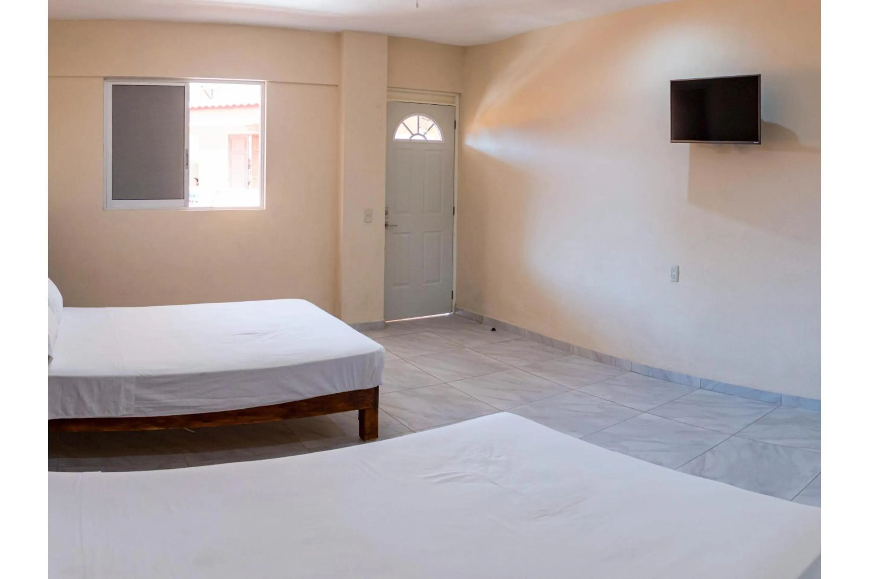 Bedroom, Bed in OYO Hotel La Playa