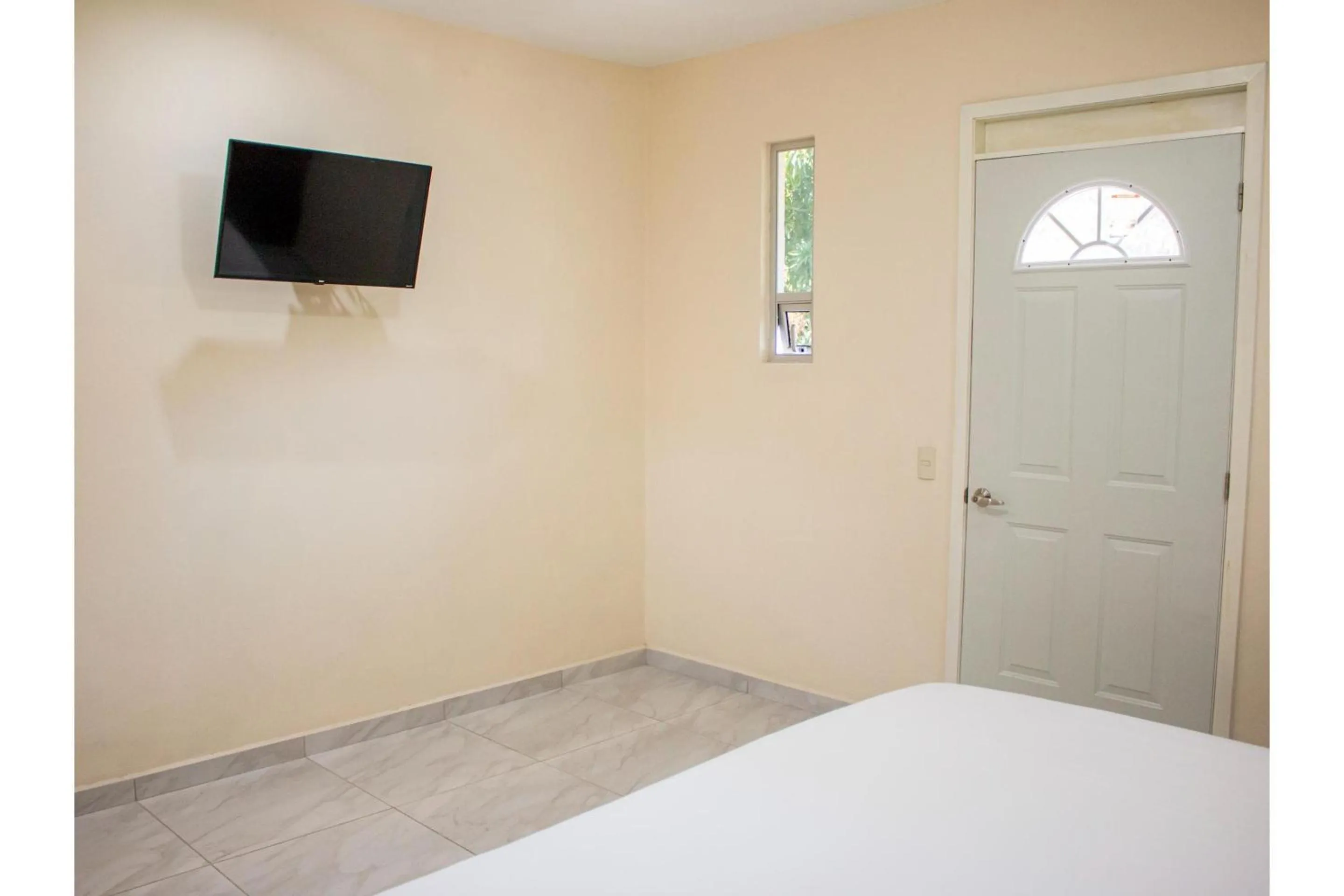 Bedroom, Bed in OYO Hotel La Playa