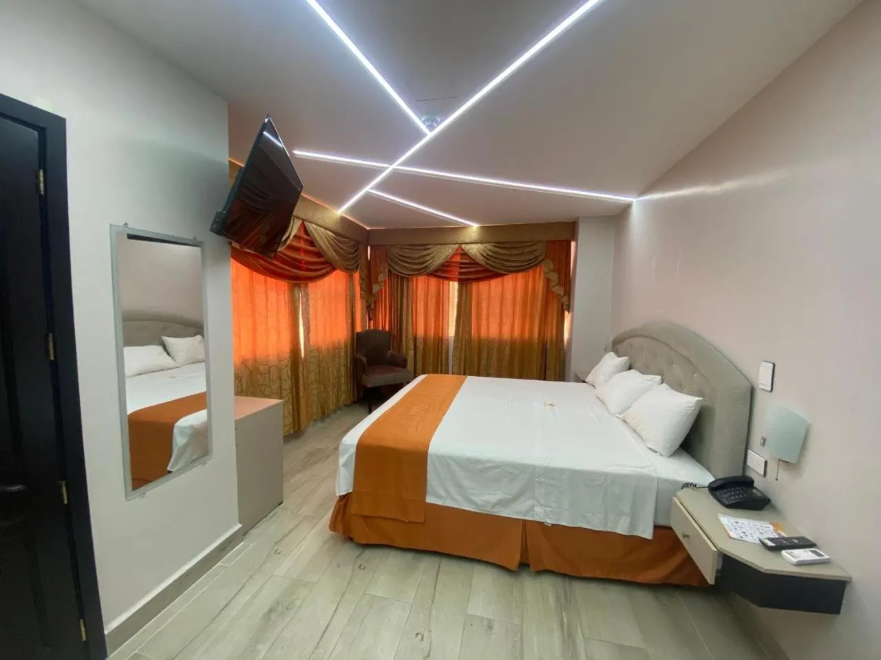 TV and multimedia, Bed in BRITNEY HOTEL Machala