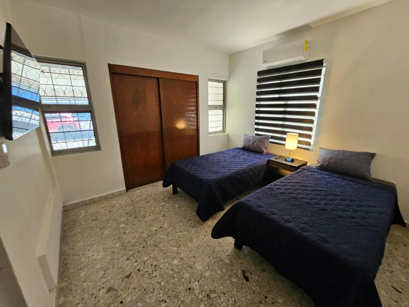 Bed in JESAVI Suites