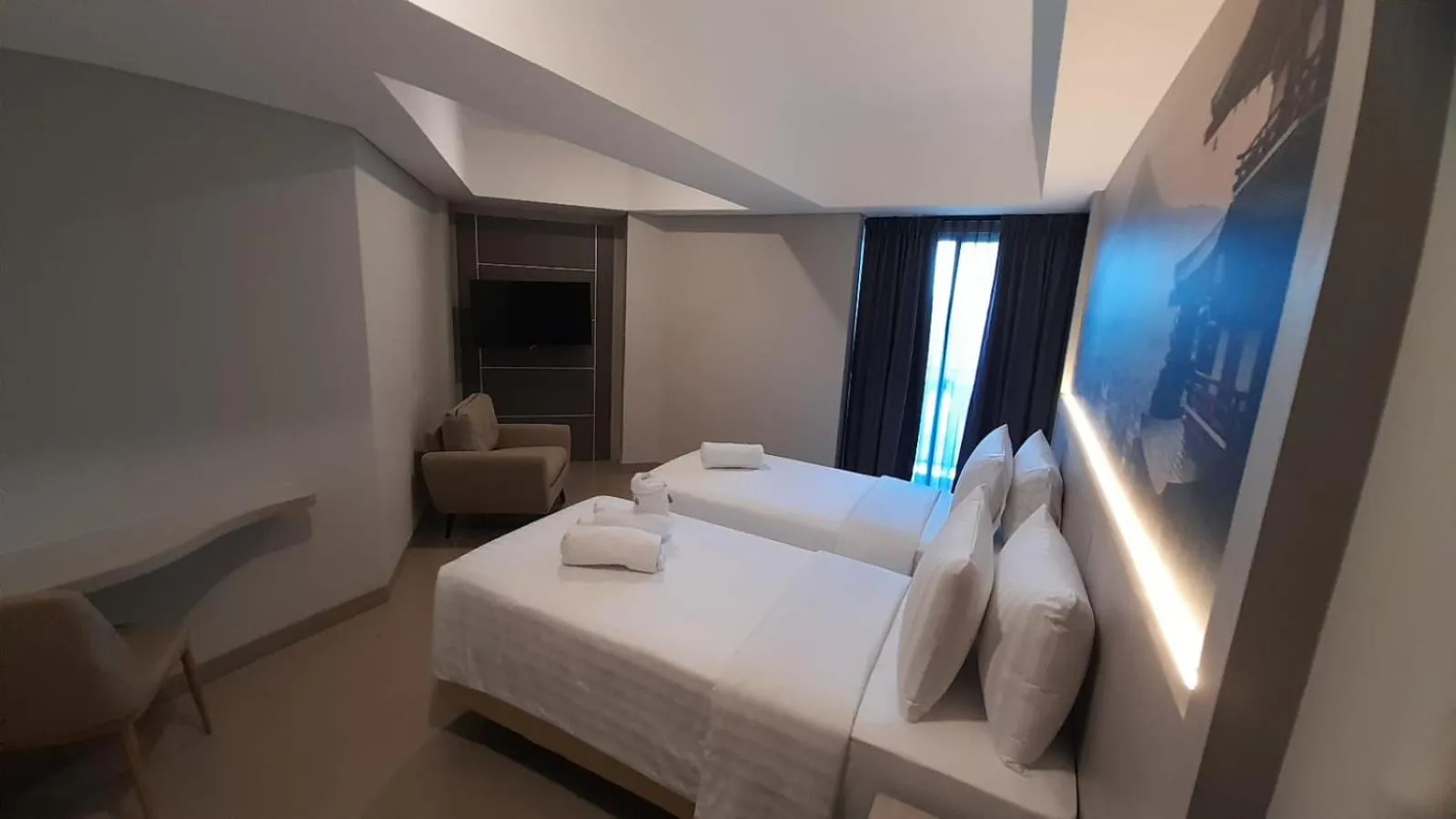 Bed in Nemuru Grand Suites