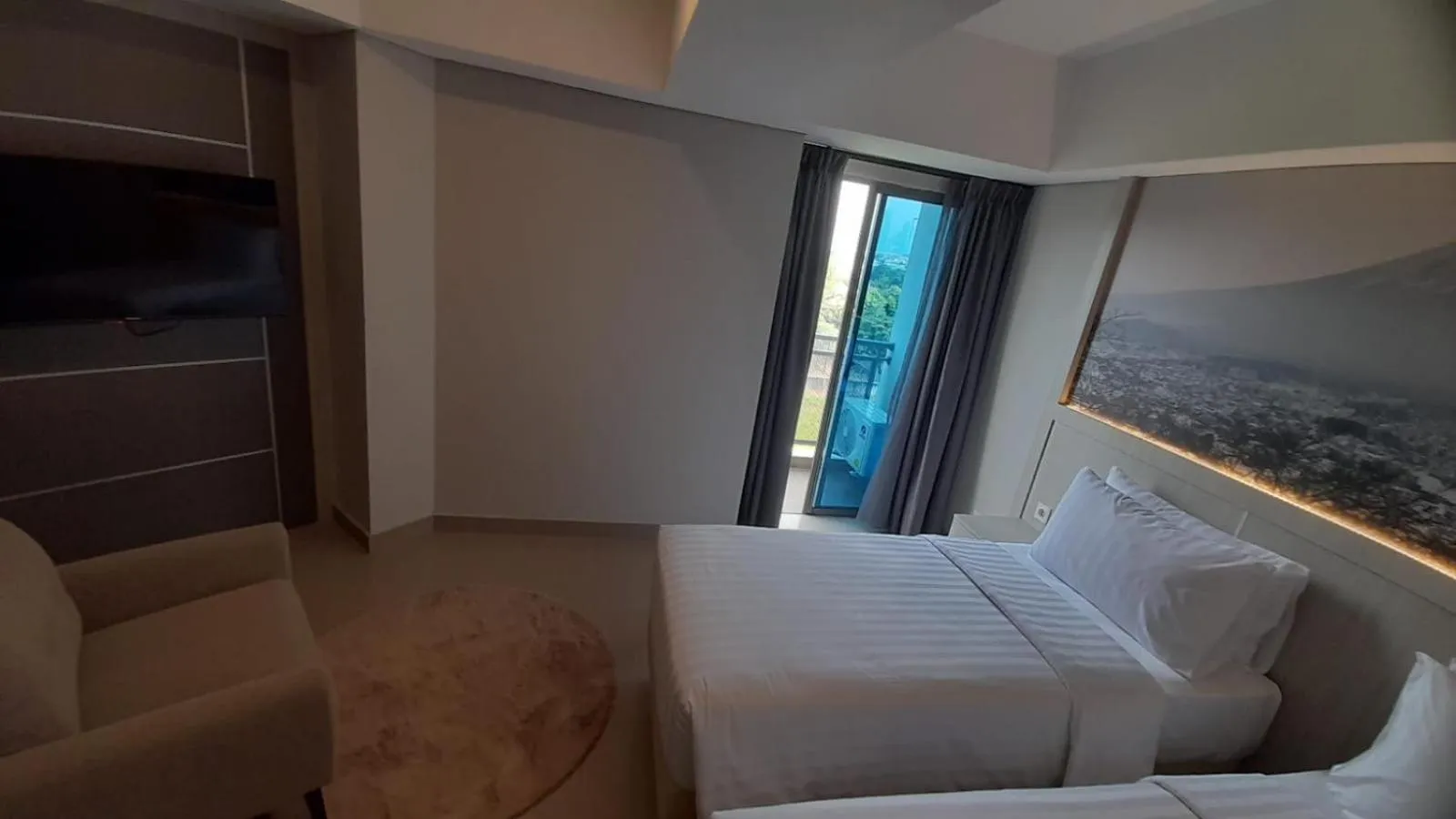 Bed in Nemuru Grand Suites