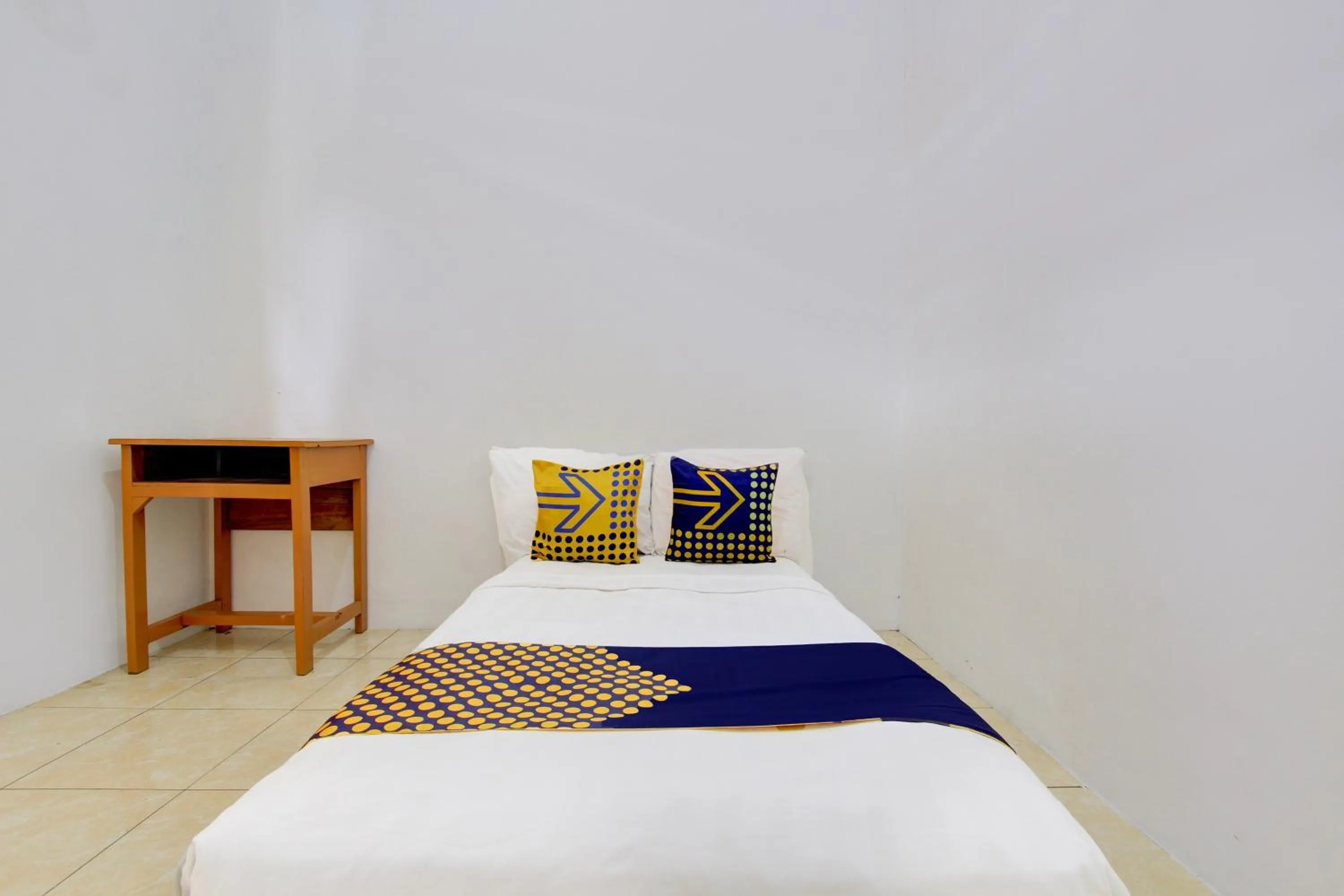 Bedroom in Hotel O Guest House Wijaya Syariah Near alun alun kota purwokerto