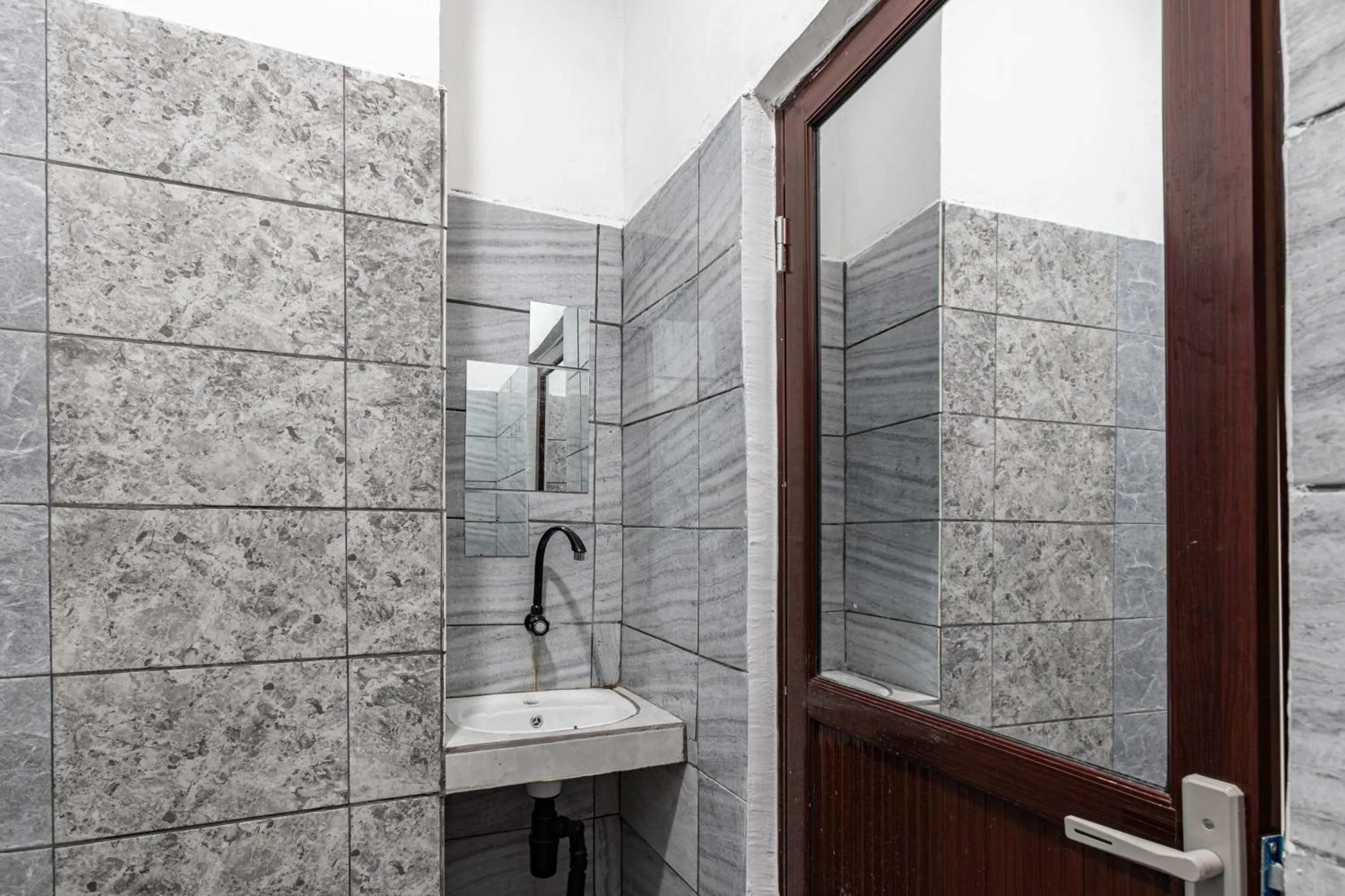 Bathroom in Hotel O Guest House Maria